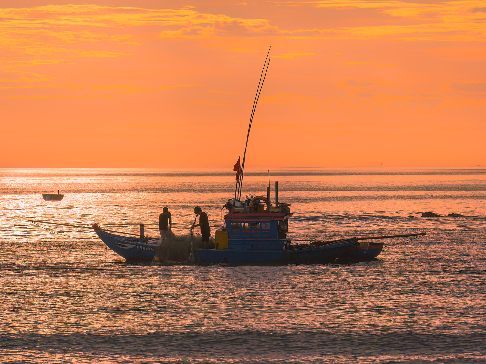 fishermen at sunrise