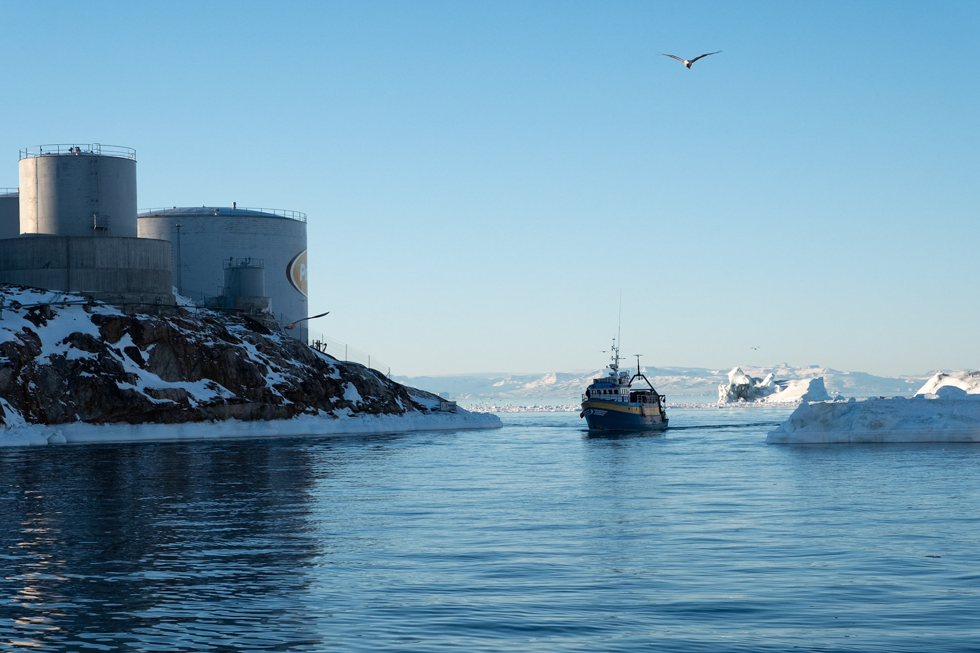 Fishing boat entering harbour