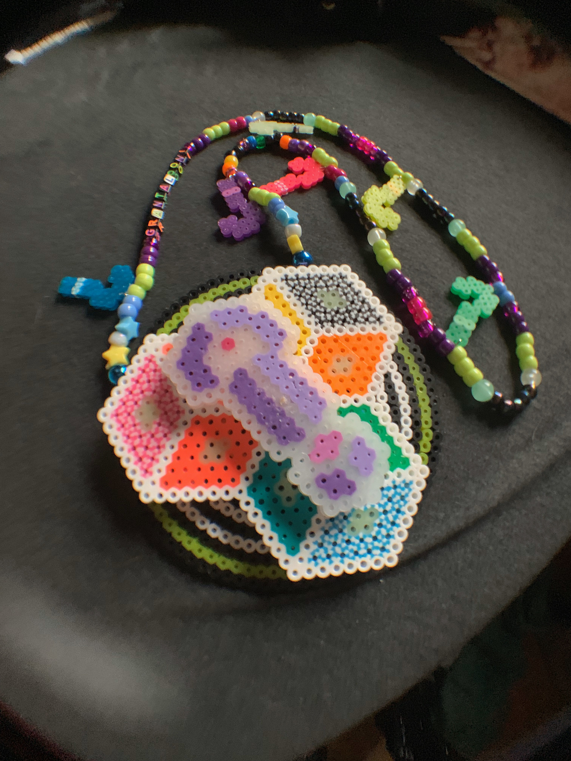 Multi-layer pearlier bead creation, middle level spins. January 2020.