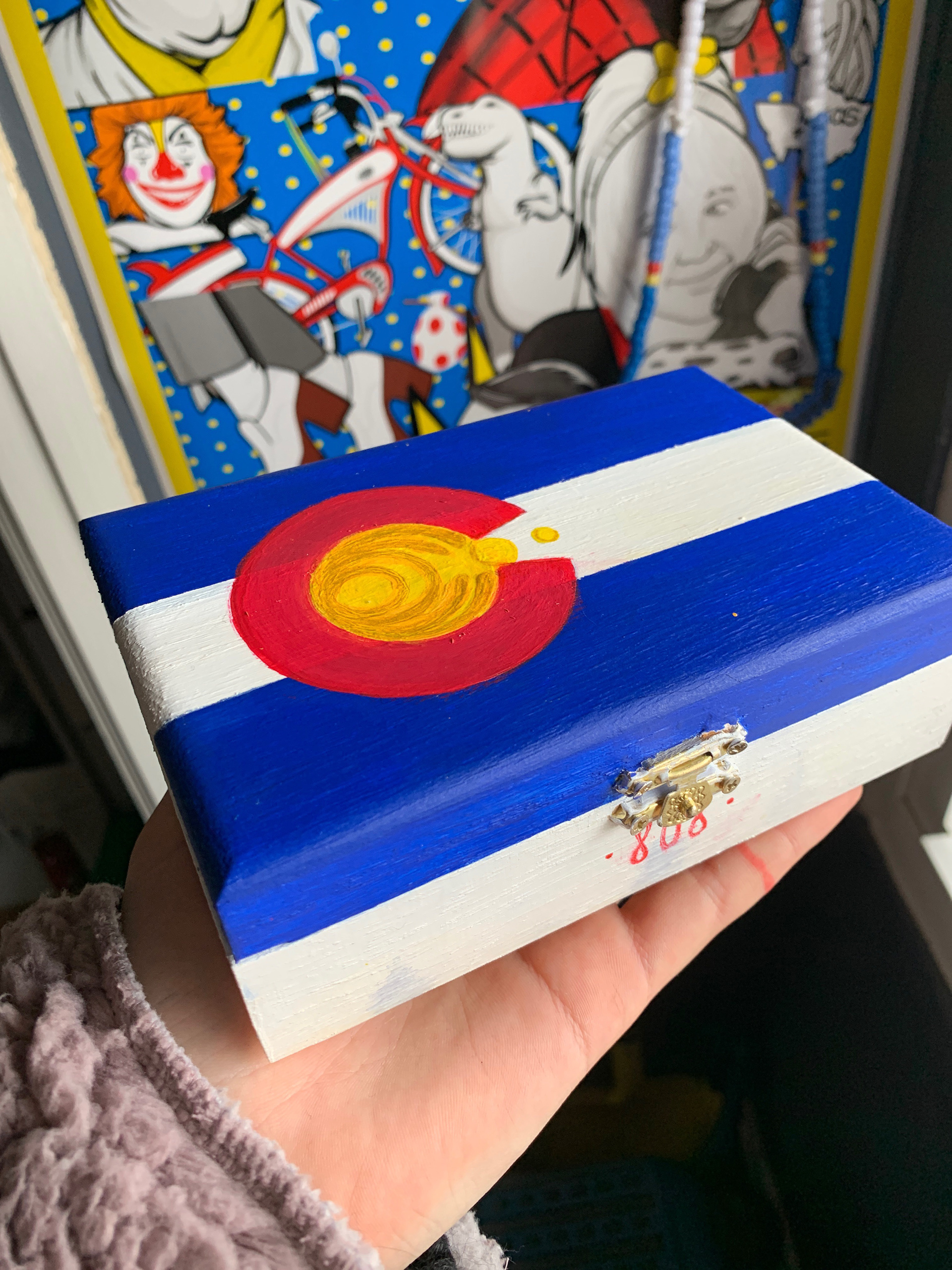 Wood box painted with acrylic.