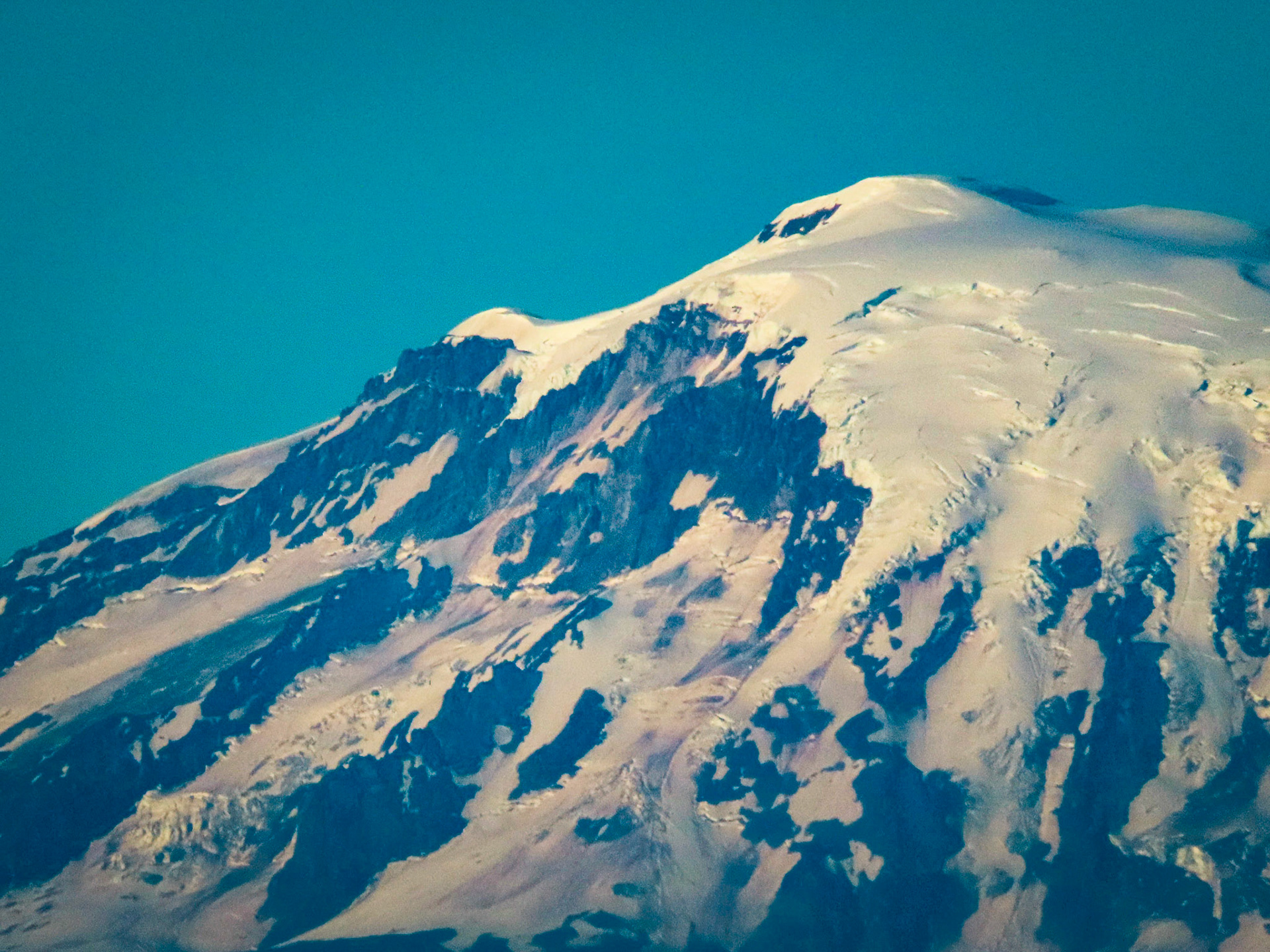 Close up of Roosevelt Cliff, Wilson Glacier and Lyman Glacier on the summit of Mt Adams volcano.