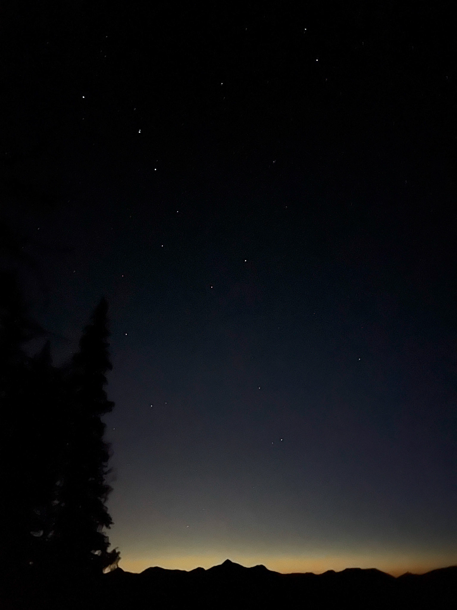 iOS 13 Night Mode after sunset. Big Dipper constellation and the Rattlesnake Peaks in the William O. Douglas Wilderness.