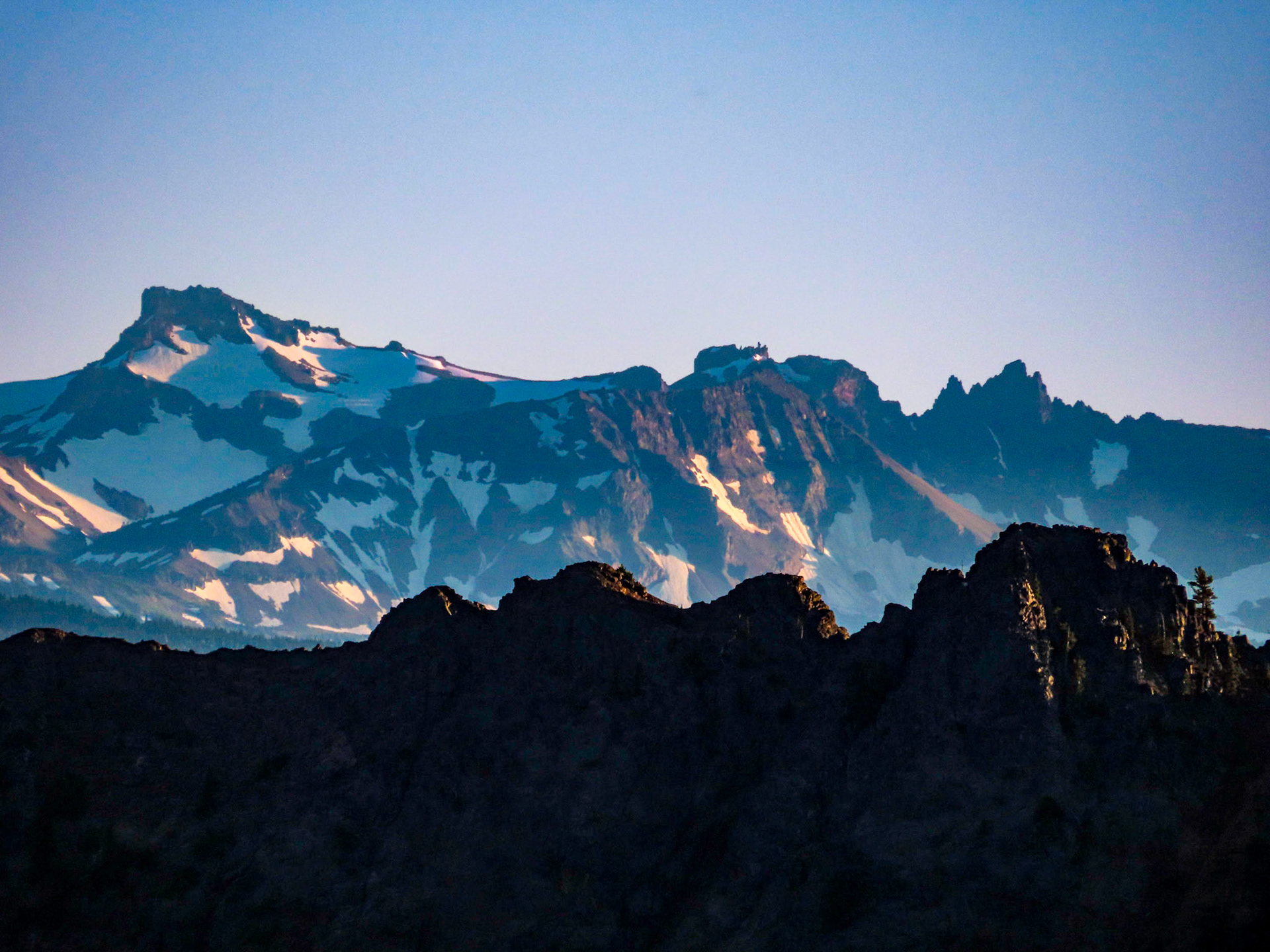 (from left) Gilbert Peak, Tieton Peak, Goat Citadel and Little Horn/Big Horn of the Goat Rocks range are illuminated in the remaining sunset light.