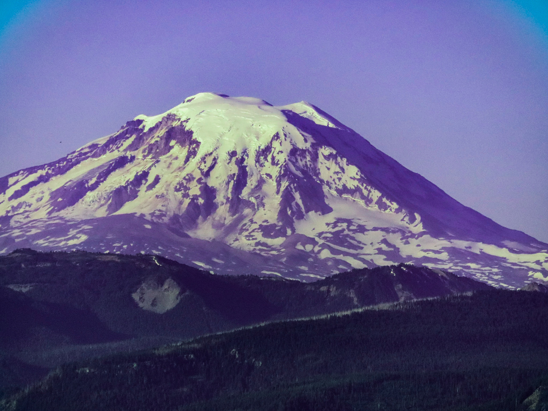 Mt Adams volcano illuminated just after Sunrise.
