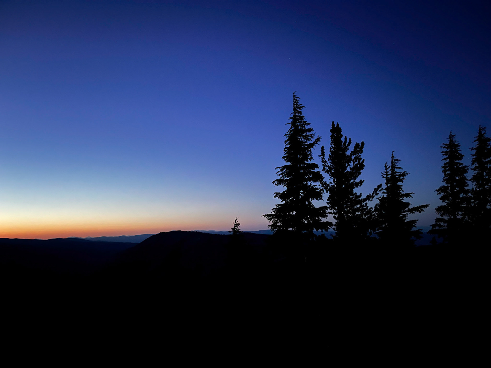 iOS 13 Night Mode after sunset, in the William O. Douglas Wilderness.