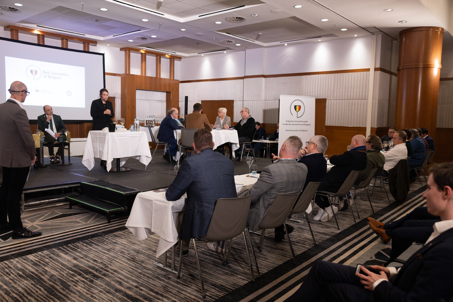 20231112 ANTWERP, BELGIUM Radisson Blu Astrid Hotel, final Best Sommelier of Belgium. Balemans Margaux – Sanglier des Ardennes is Bussy with her test on the picturesThis official title, unlike various commercial initiatives, not only comes with a trophy, valuable prizes, and enduring recognition but also opens doors for the winner to compete in European and World Championships. These global competitions are organized by ASI (Association Sommeliers International), currently led by the Belgian William Wouters.