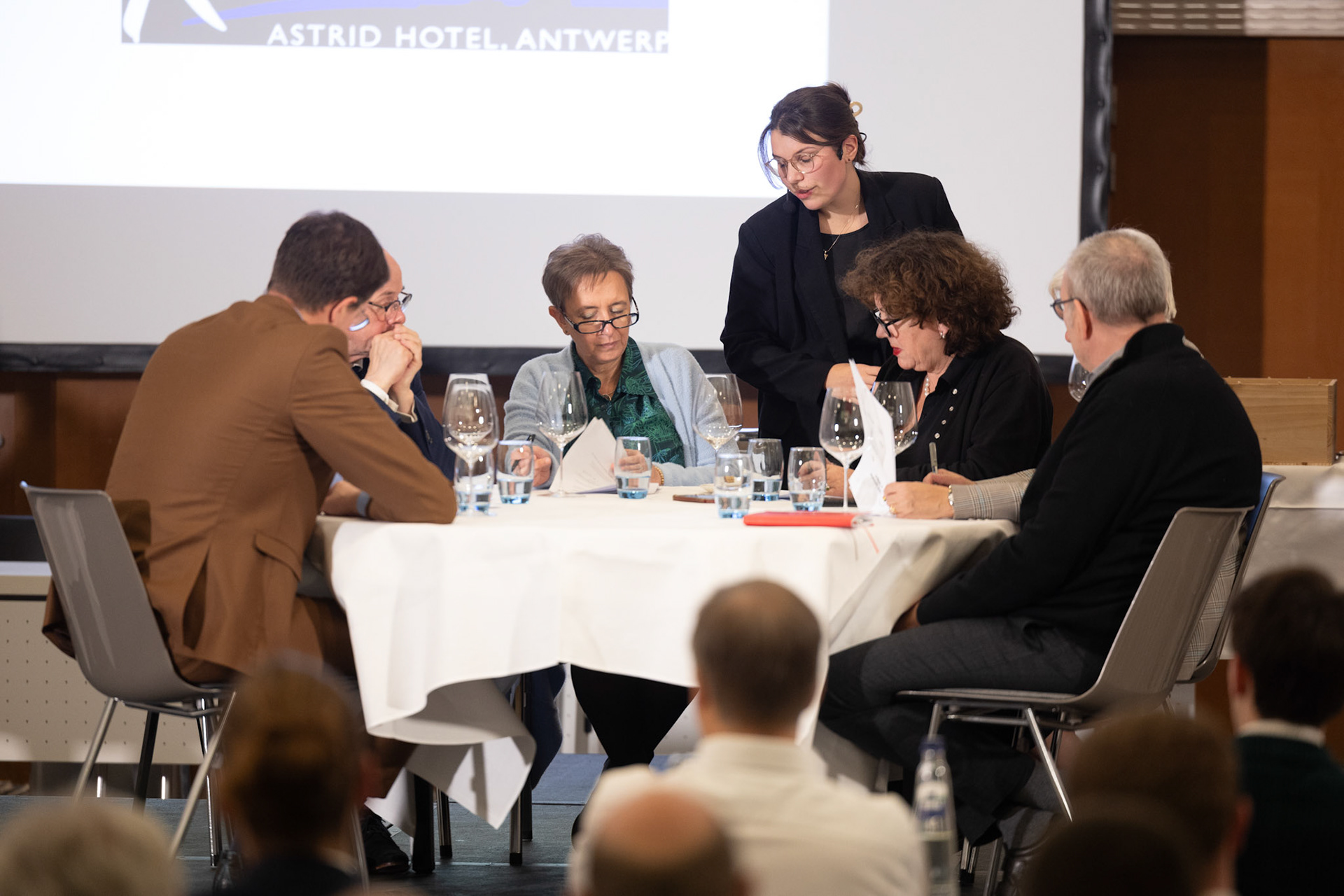 20231112 ANTWERP, BELGIUM Radisson Blu Astrid Hotel, final Best Sommelier of Belgium. Three candidates emerged from a pool of 14 in the semi-final, and the finalist is yet to be (-)After six practical tests that assessed participants' extensive knowledge, craftsmanship, and ability to handle stress, it was revealed that ……….. emerged as the ultimate winner. Employed at restaurant …………, ……….. will proudly carry the title not just for this year but throughout his entire professional career, as the title is a one-time achievement. The annual competition is organized by the Belgian Sommeliers Guild, with a distinguished jury comprising influential figures from the wine industry, past winners, and international members. This official title, unlike various commercial initiatives, not only comes with a trophy, valuable prizes, and enduring recognition but also opens doors for the winner to compete in European and World Championships. These global competitions are organized by ASI (Association Sommeliers International), currently led by the Belgian William Wouters.