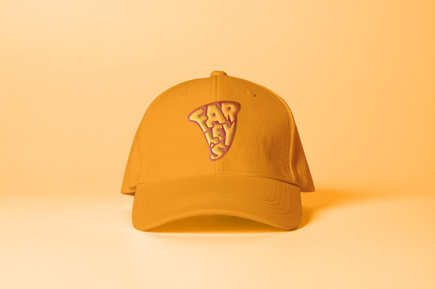Farley's brandmark mockup on yellow hat.