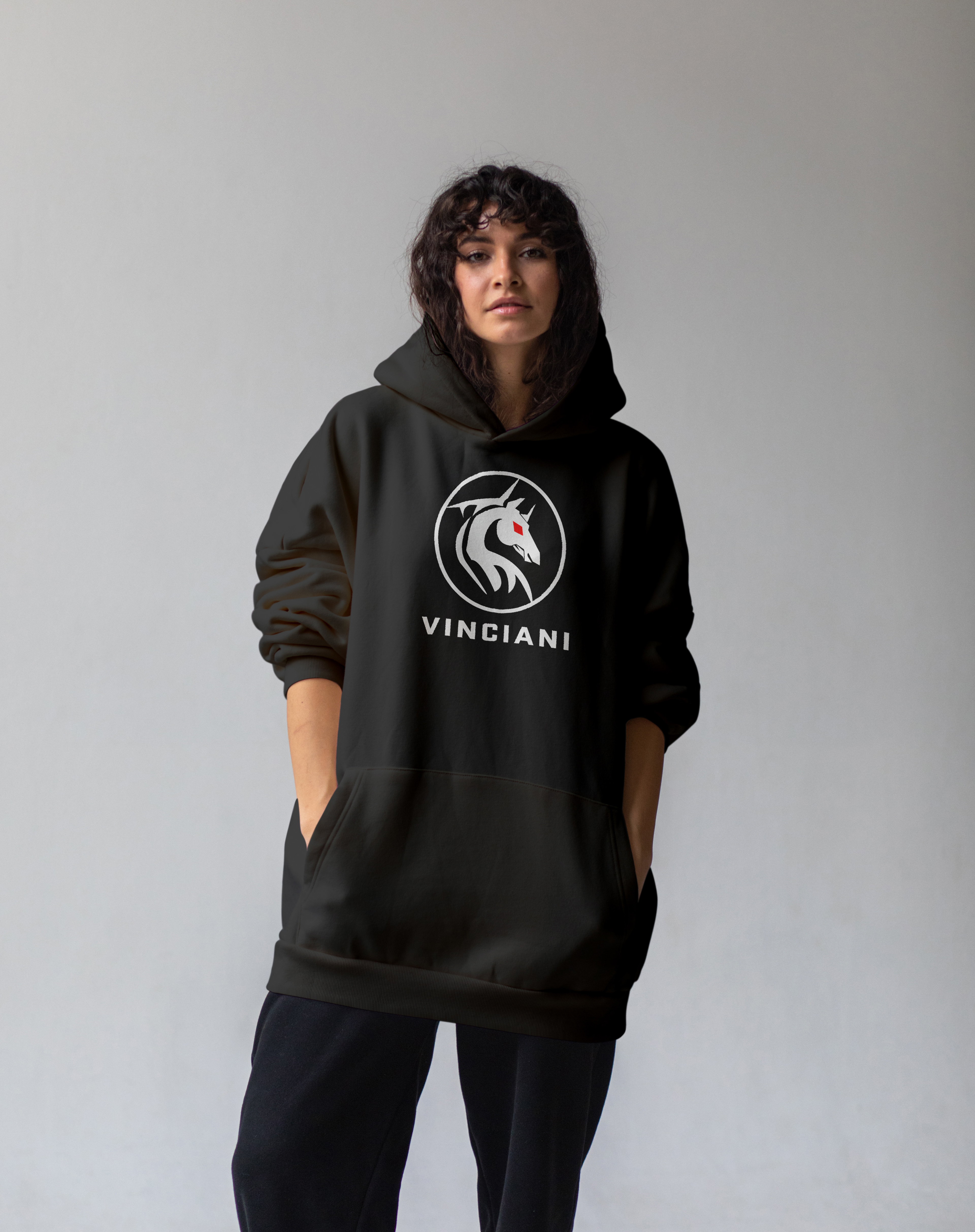 Black hoodie featuring the Vinciani heritage horse emblem with red eye detail, representing the heritage mark of the House of Vinciani.