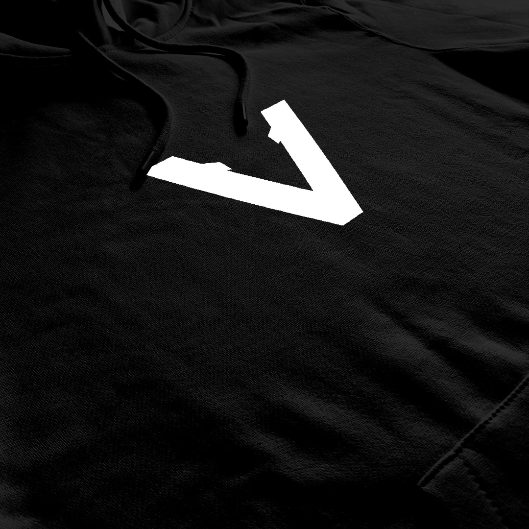 Black Vinciani hoodie close-up with bold white V logo, premium fabric texture and clean minimalist composition