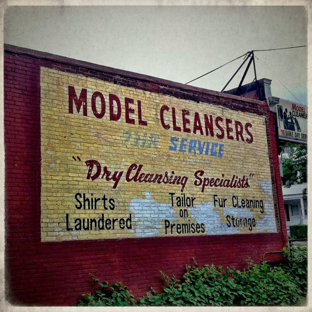 83. Model Cleansers Sign ••• Along Cummins Highway in the heart of Mattapan, this Model Cleansers ghost sign is easy to miss because it faces an alley. (#83 of 100 in the Boston Signage Project)