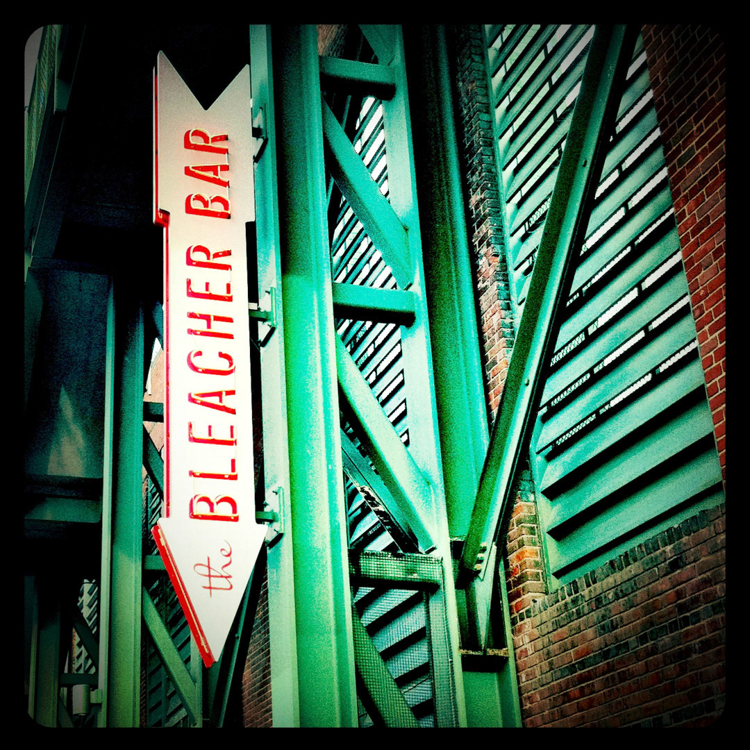28. Bleacher Bar Sign ••• Open year-round since 2008, the Bleacher Bar is one of the coolest bars in the city. It’s built right into the Green Monster at Fenway Park and provides a garage door-sized view onto center field. (#28 of 100 in the Boston Signage Project)