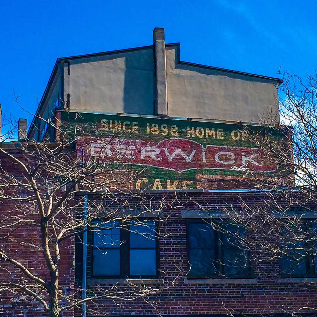 98. Berwick Cake Co Sign ••• The Berwick Cake Company went out of business in 1977, but made a significant contribution to the world back in in the 1920s. According to food historians, Berwick was selling a product with 2 mound-shaped pieces of chocolate cake with a sweet filling sandwiched between them. They were not selling well. As a marketing stunt, the company had the actors of the Broadway show "Makin' Whoopee," then playing in Boston, toss the cakes into the audience at curtain call. They were an immediate hit, and the Whoopie Pie was born. (#98 of 100 in the Boston Signage Project)