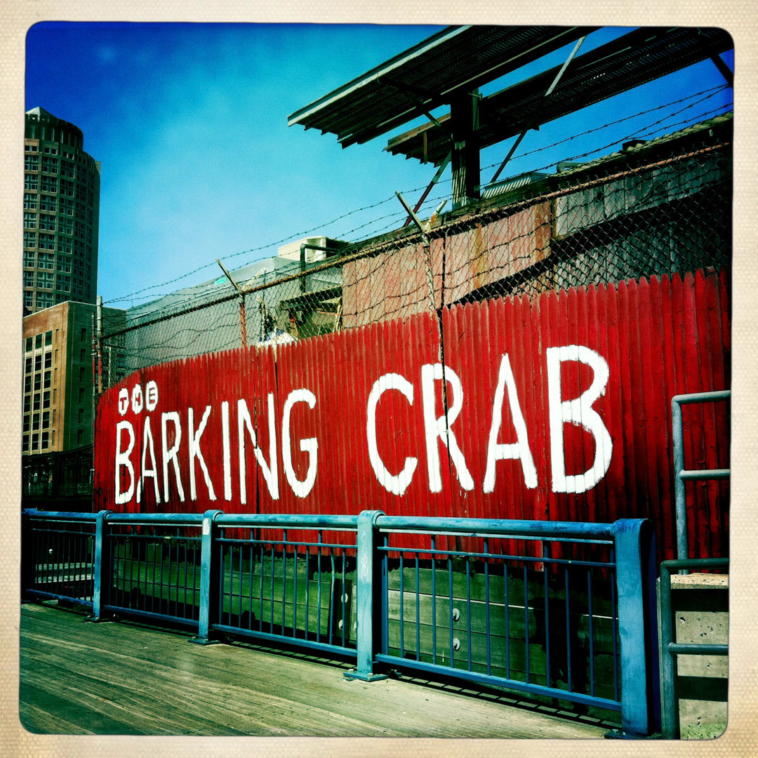 19. The Barking Crab Sign ••• Not far from the Children’s Museum along the Fort Point Channel is the Barking Crab, one of the great local seafood joints. What’s interesting about this sign, aside from the hand-painted red, is that it hardly gets seen. It’s located on the south side of the restaurant, practically hidden by an overpass and only foot traffic along the waterfront can view it. (#19 of 100 in the Boston Signage Project)