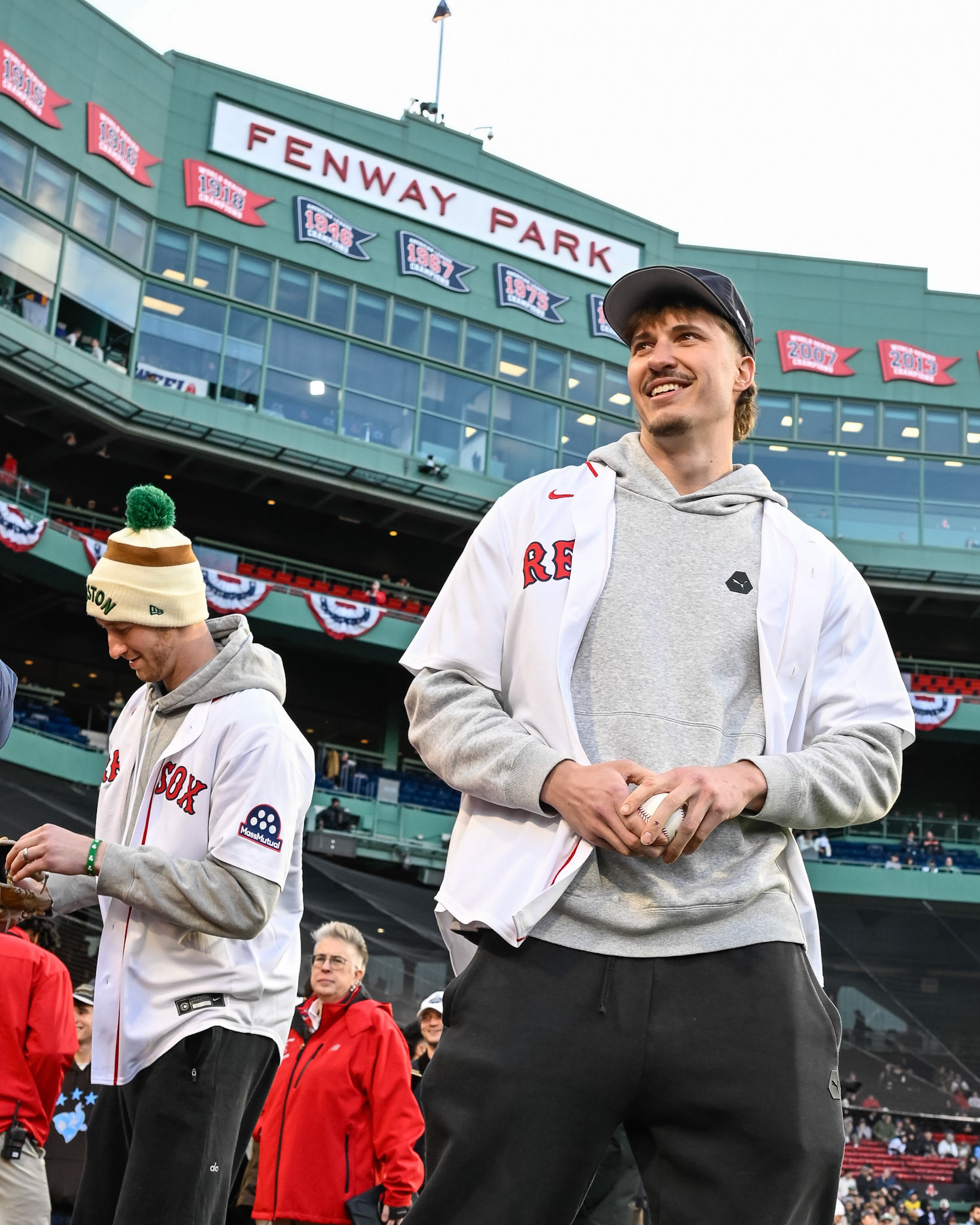 BOSTON, MA - APRIL 6, 2026: Boston Celtics players Derrick White, Sam Hauser, Baylor Scheierman and Ron Harper Jr. throw out the first pitch in a Red Sox game at Fenway Park (Photo by Keith Sliney).