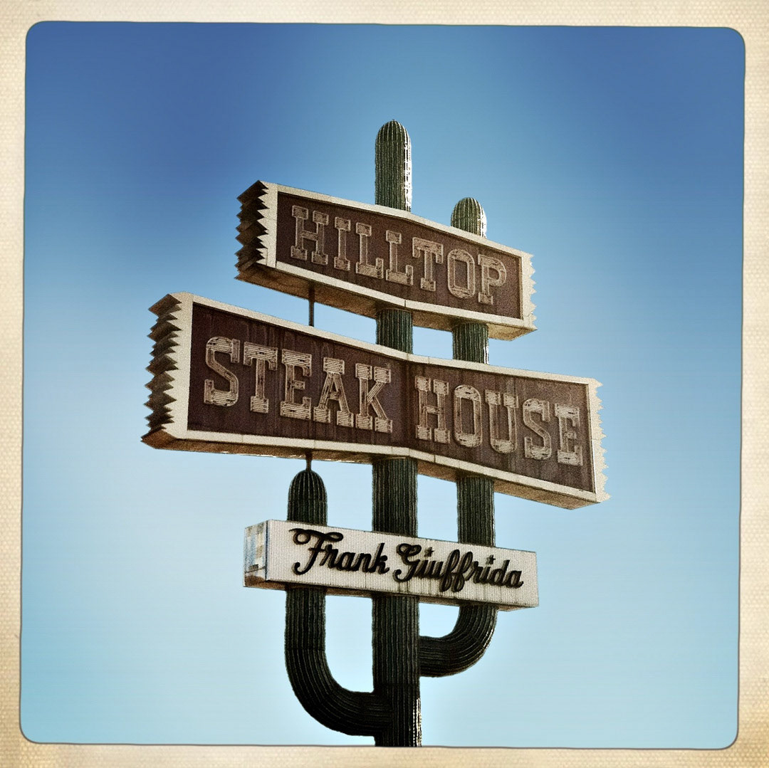 11. Hilltop Steak House Sign ••• Anyone who’s ever driven down Rt. 1 near Boston will recognize this 80-foot monster. Frank Giuffrida, who converted the Hilltop into a western-style steakhouse 1961, had this eye-catcher of a sign built in 1964 for $68,000. Giuffrida apparently liked to think big, as the Hilltop became one of the largest steakhouses in the U.S. (#11 of 100 in the Boston Signage Project) ••• 2023: Update: The Hilltop Steak House closed in 2013. The catus sign was converted into a new sign for "Avalon at Hilltop", a residential and commercial development next door.