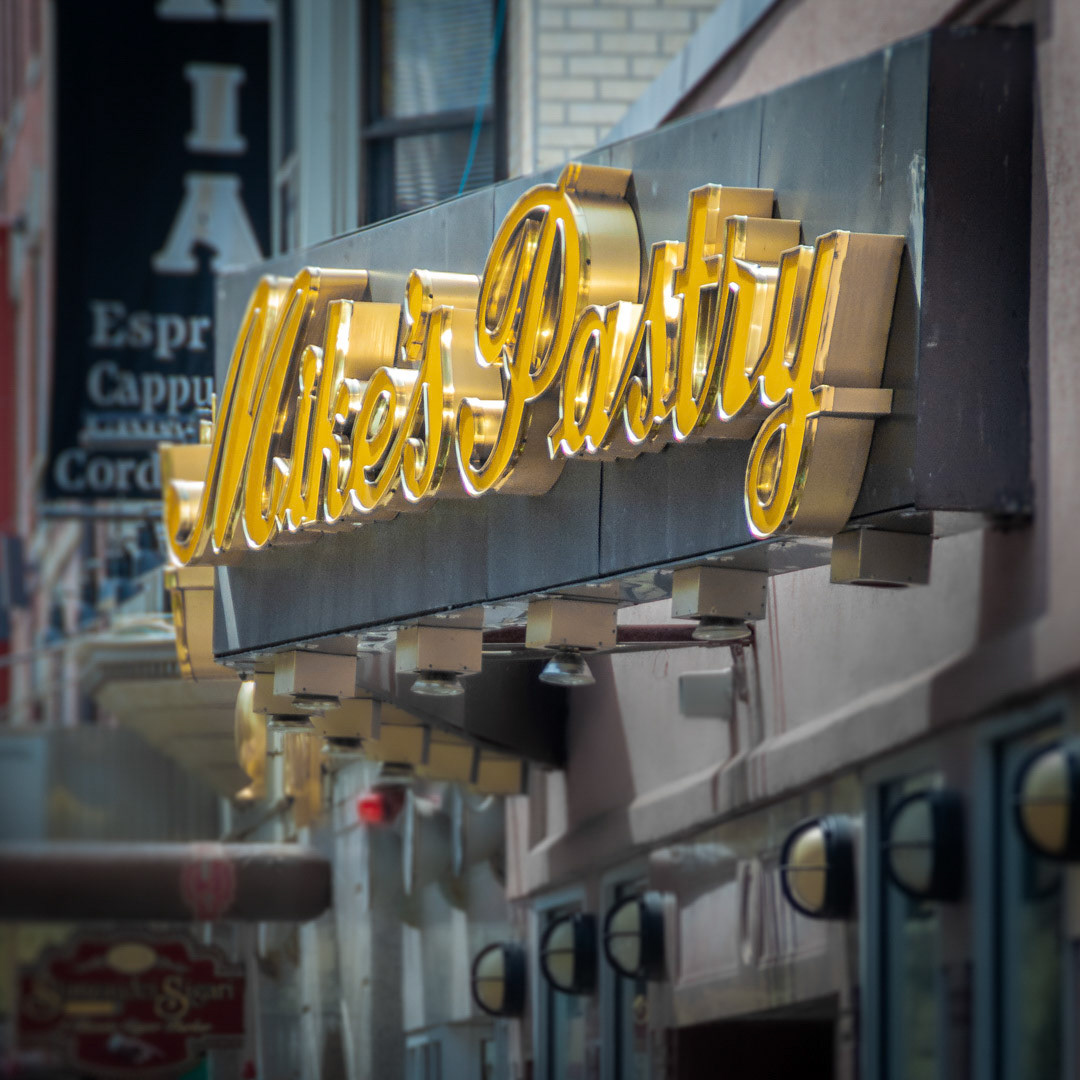 7. Mike's Pastry Sign ••• This classic sign of the famous Mike’s Pastry jumps out at you and begs you to enter as you’re strolling through Boston’s North End. It’s almost as good as their cannolis. (#7 of 100 in the Boston Signage Project)
