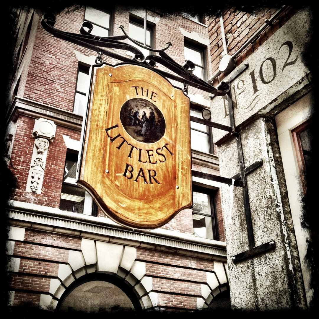 34. Littlest Bar Sign ••• Since it was relocated into the financial district from their original spot on Province Street, the Littlest Bar doesn’t seem so “little” anymore. But it does have one of the coolest attractions — tables with built-in taps so you can pour your own Guinness. (#34 of 100 in the Boston Signage Project) ••• 2023 Update: The bar fell victim to condo developments and was shutdown in 2015. Status of the sign is unknown.