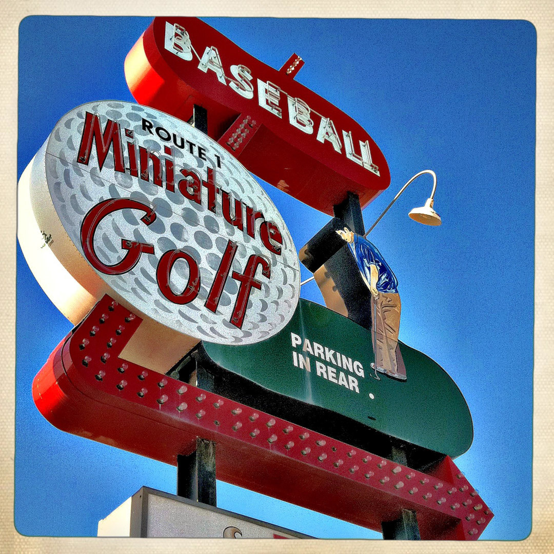 79. Route 1 Mini Golf Sign ••• This multi-layered retro sign is the face for this mini golf joint in Saugus, but it usually plays second fiddle another tall structure on the property – a 12-foot high orange dinosaur that looms over Route 1. (#79 of 100 in the Boston Signage Project) 2023 Update: the business shut down in 2017 and land sold to a developer. Building was razed, status of sign is unknown.