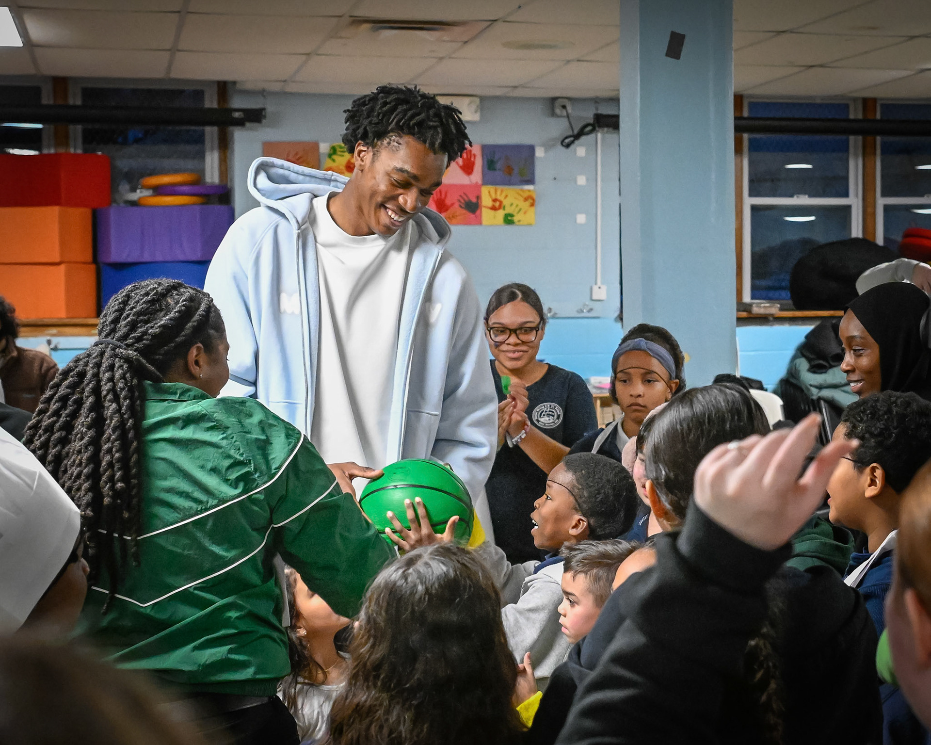BOSTON, MA - MARCH 5, 2026: Boston Celtics players Derrick White, Hugo Gonzalez and Amari Williams visit youth at a Sun Life Fit to Win nutrition health event at East Boston YMCA . (Photo by Keith Sliney).