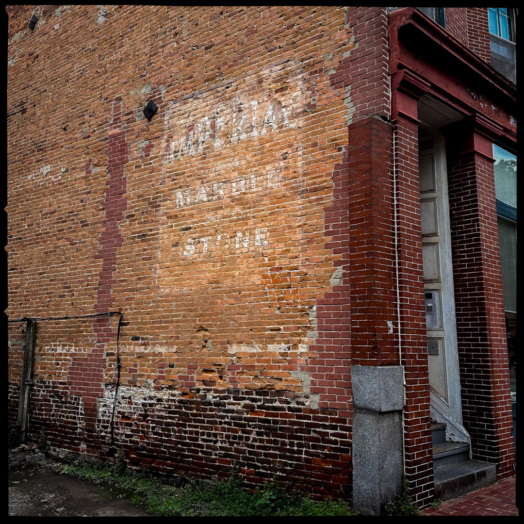 49. Imperial Marble and Stone Ghost Sign ••• The origination of this ghost sign on the side of a brownstone on Shawmut Ave is largely a mystery. It’s unclear if it was exposed after the adjacent building came down, or if it was painted on afterward. Either way, the great classic typography makes it a hidden gem of the South End. (#49 of 100 in the Boston Signage Project)