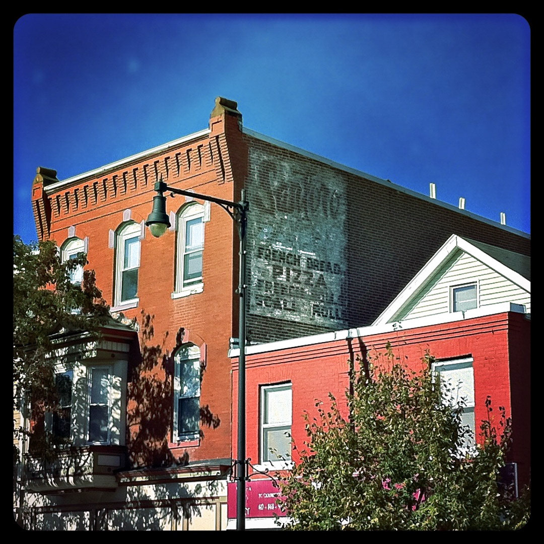 89. Santoro Bakery Ghost Sign ••• This old brick building in Cambridge now houses a dentist and tanning salon, but still reveals a sign of yesteryear as a reminder where you could go to get top-notch french bread pizza and scali rolls. (#89 of 100 in the Boston Signage Project)