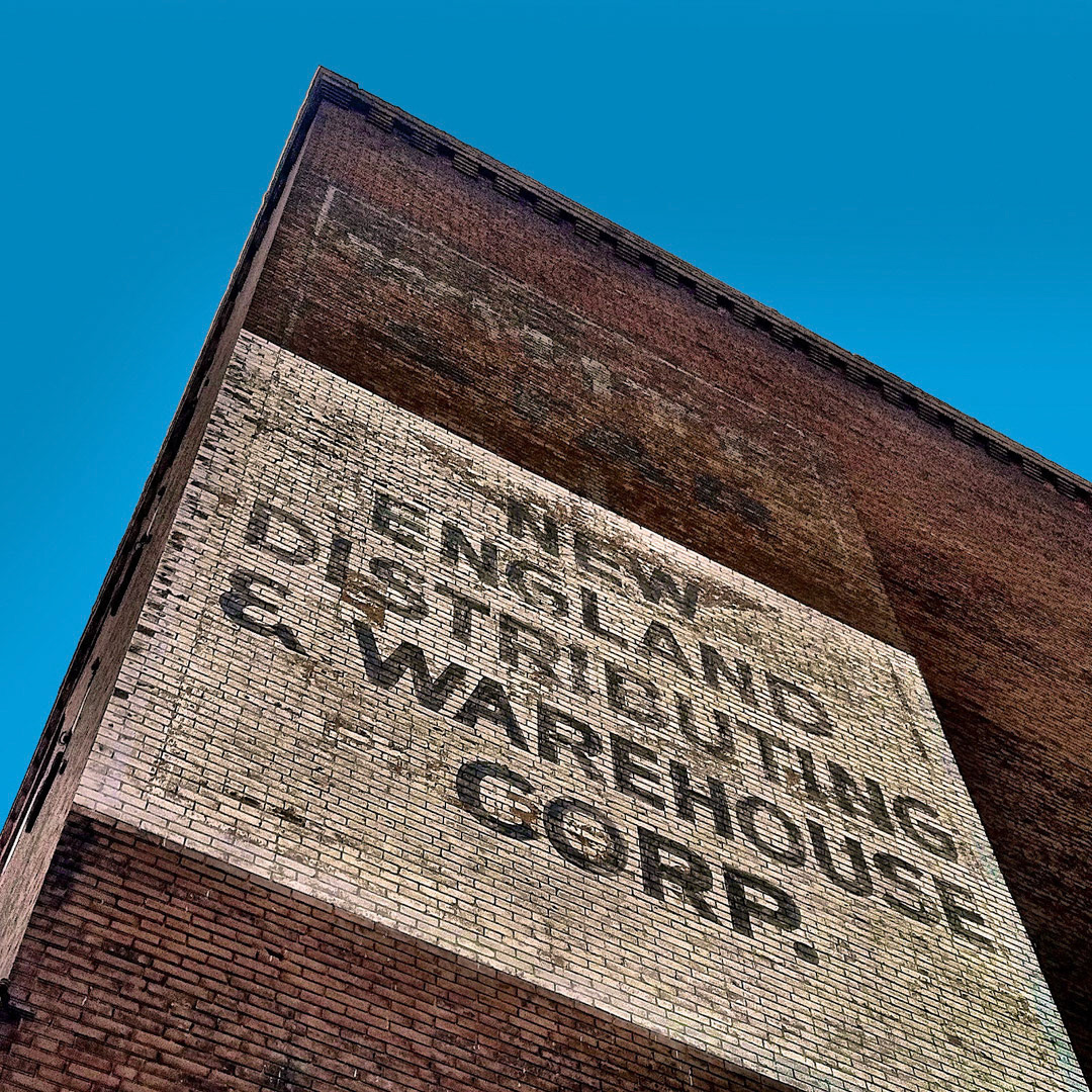 6. New England Distributing Ghost Sign ••• This sign is on an old warehouse in the Charlestown Navy Yard not far from the USS Constitution. I believe it was most recently used by Borden Candy (which was later bought out by NEECO). More interesting is the barely readable “White Star” near the top. I’m not sure what was going on here 100 years ago, but the White Star Line was a notable British shipping company which built some damn famous vessels, including the Titanic. (#6 of 100 in the Boston Signage Project)