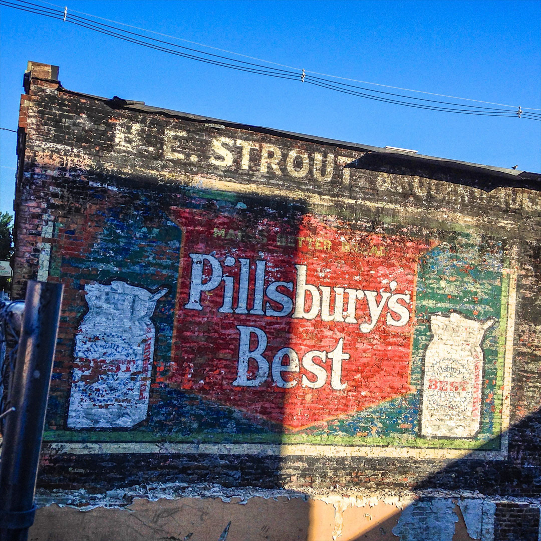 92. Pillsbury's Best Sign in Chelsea ••• This spot on Congress Avenue in Chelsea was a longstanding home to the popular El Dorado Bakery until it was destroyed by fire in late 2013. The brick wall of the adjacent building was exposed once the charred remains were removed, revealing an amazing Pillsbury painted ghost sign which had been unseen for decades. (#92 of 100 in the Boston Signage Project) ••• 2023 Update: A new building was constructed on the site, covering up the painted brick sign.