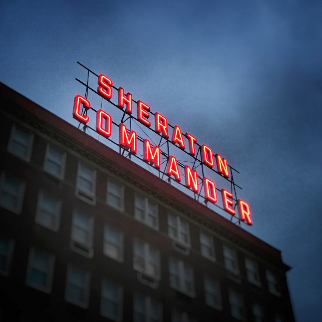 96. Sheraton Commander Sign ••• Adjacent to the Cambridge Common in historic Harvard Square, the Commander has been a landmark  since it was opened in 1927. The hotel pays homage to George Washington, who took command of the Continental Army in here in 1775. Back in the sixties it became one of the first franchised Sheraton hotels. The signature red neon sign still towers overhead outside, one of the few remaining roof-mounted signs in the city. (#96 of 100 in the Boston Signage Project)