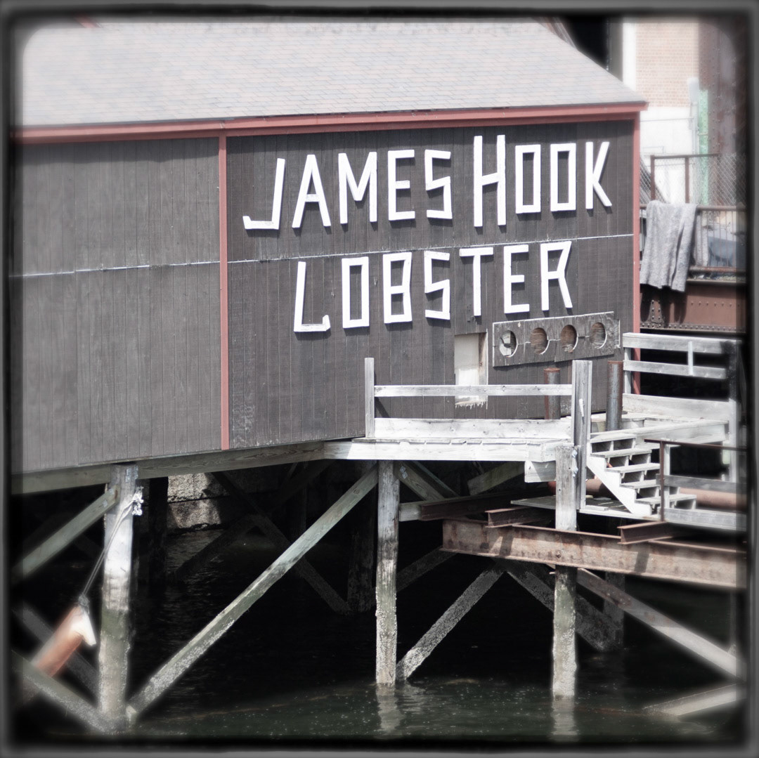 8. James Hook Lobster Sign ••• This century-old seafood company was shaken to the core in 2008 when a fire destroyed most of their building along with 60,000 lbs of lobster. This little shack and cool handmade sign was all that remained, although the business survived and is vowing to thrive. (#8 of 100 in the Boston Signage Project)