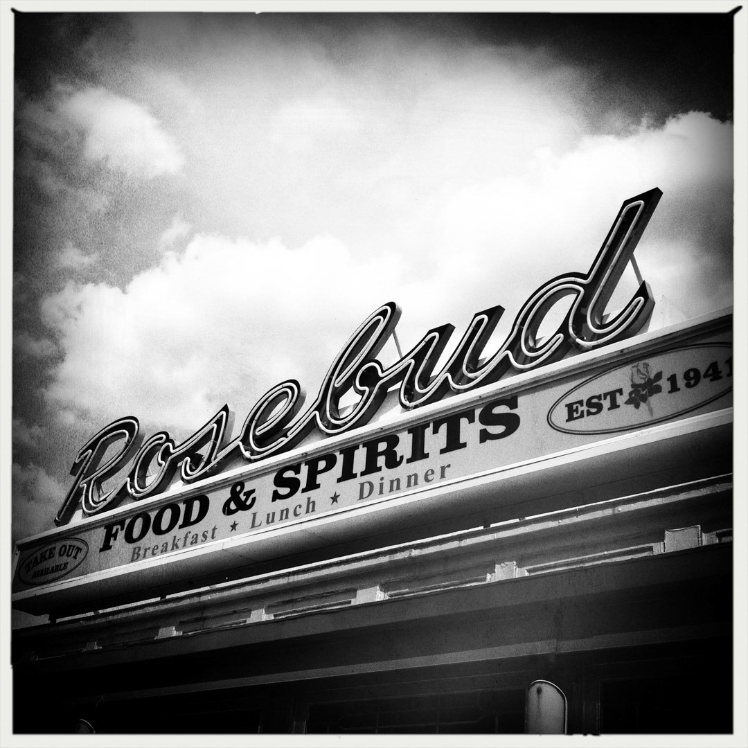 59. Rosebud Diner Sign ••• Rosebud is one of those vintage American diners that will take you back to a simpler time. Built in 1941, it is housed in a restored streamlined Worcester lunch car that looks like it could roll down the tracks at any moment (if it had wheels instead of a brick base). And the awesome script neon sign atop the diner lights up bright pink just in time for supper. (#59 of 100 in the Boston Signage Project)