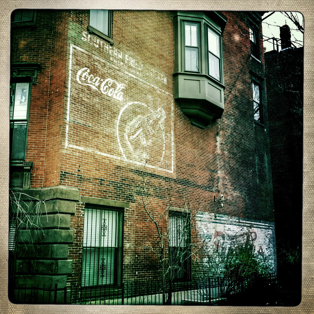 86. Coke-Pepsi Ghost Sign ••• There’s no shortage of Coke ghost signs in the city and this one resides on the side of a brownstone on the corner of Rutland Square and Columbus Ave in the South End. Strangely enough it’s paired up with another aging painted sign on the same wall – a vintage logo of longtime rival Pepsi. (#86 of 100 in the Boston Signage Project)