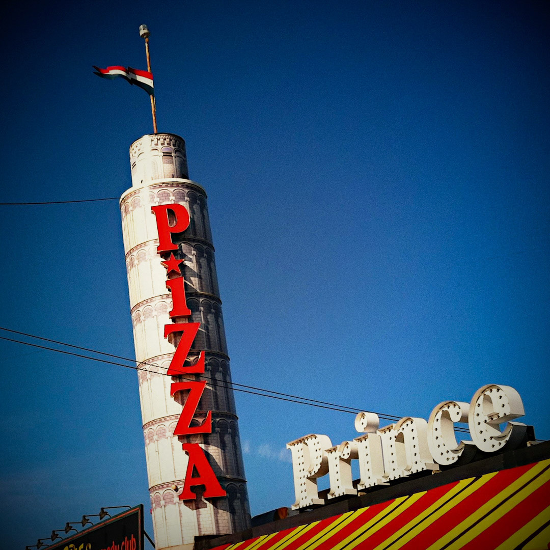 41. Prince Pizza Sign ••• Prince is famous for it’s great pizza and old-school family atmosphere, but it’s a landmark because of it’s leaning tower of pizza along Route 1. (#41 of 100 in the Boston Signage Project)