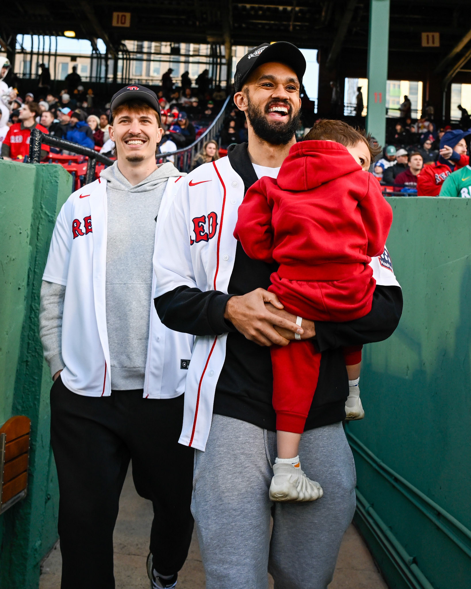 BOSTON, MA - APRIL 6, 2026: Boston Celtics players Derrick White, Sam Hauser, Baylor Scheierman and Ron Harper Jr. throw out the first pitch in a Red Sox game at Fenway Park (Photo by Keith Sliney).