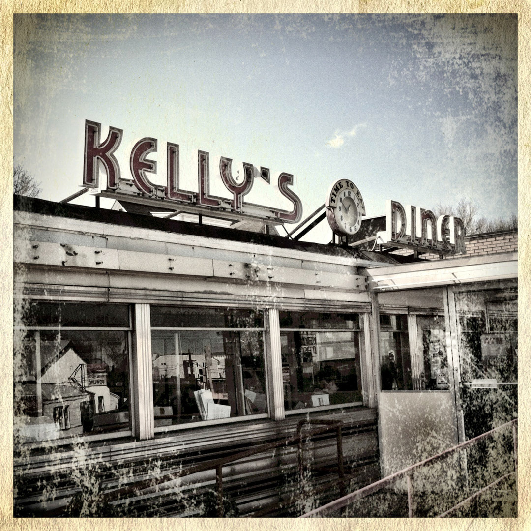 87. Kellys Diner Sign ••• This great neon sign and old-school clock sit atop a two-piece dining car known as Kelly's Diner in Somerville.  (#87 of 100 in the Boston Signage Project)