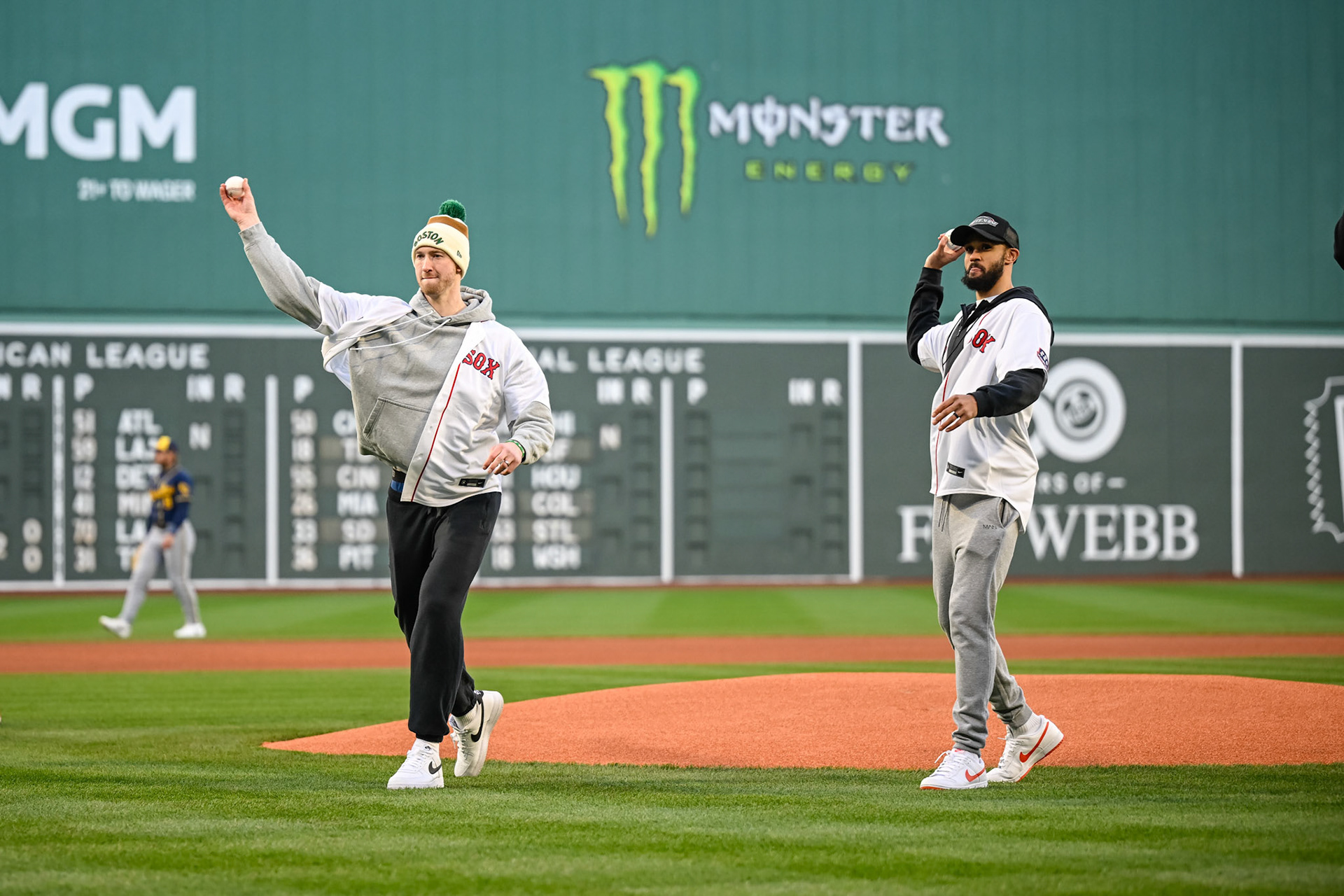 BOSTON, MA - APRIL 6, 2026: Boston Celtics players Derrick White, Sam Hauser, Baylor Scheierman and Ron Harper Jr. throw out the first pitch in a Red Sox game at Fenway Park (Photo by Keith Sliney).