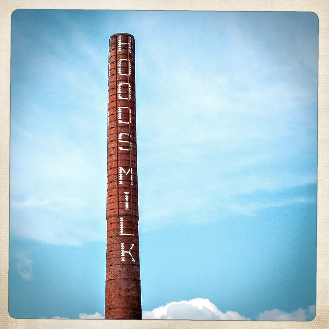 52. Hoods Milk Plant Sign ••• Not far from the Bunker Hill monument sits another jutting structure known locally as the smokestack of the "Hood Plant". Hood as been a well known dairy icon in New England for over a century, and recently has expanded it's reach beyond the northeast. This facility is now mainly used for R&amp;D but this pillar displaying the brand remains for those traveling along Rt. 93. (#52 of 100 in the Boston Signage Project)