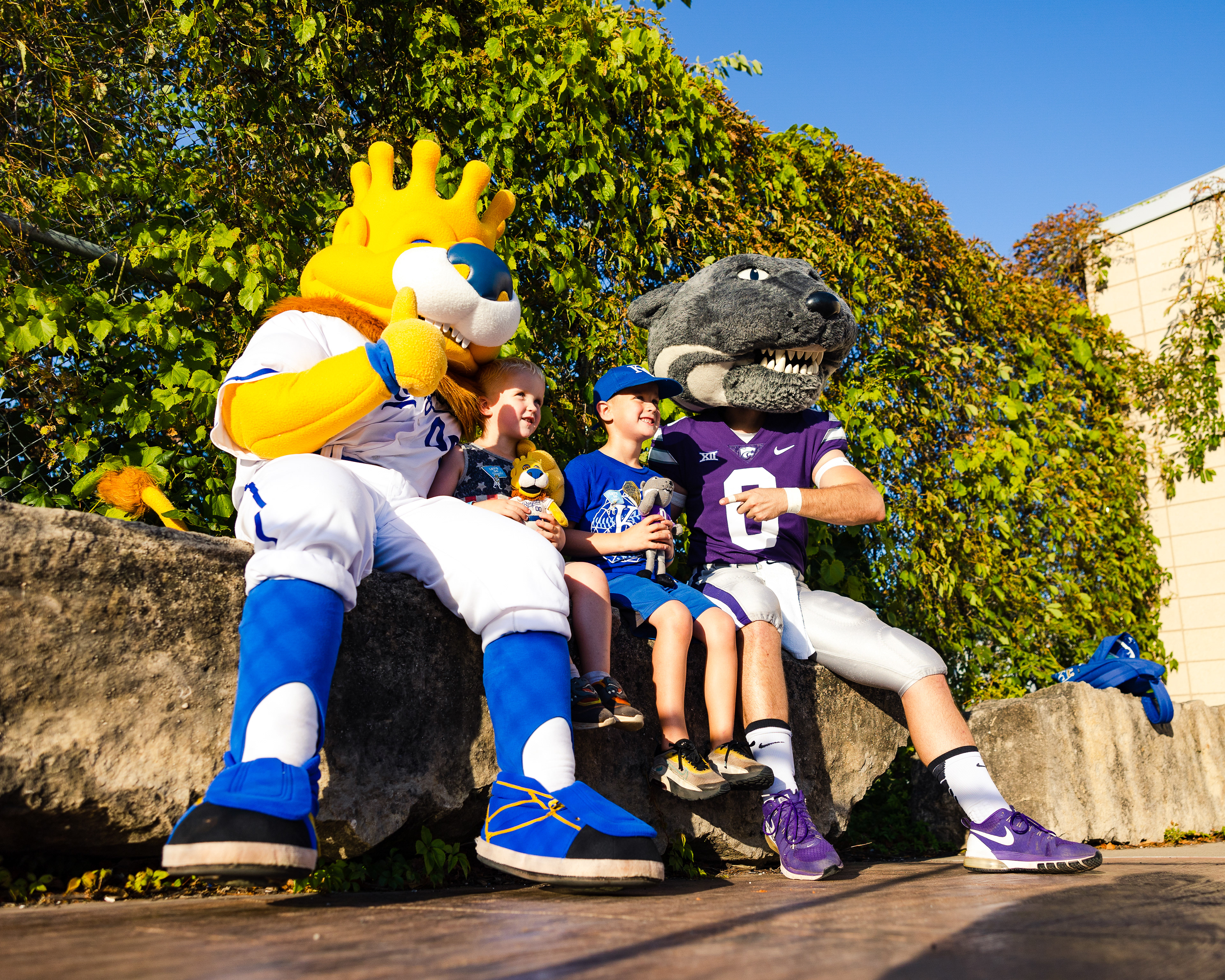 Kansas City Royal's mascot Slugger meets Kansas State's Willie the Wildcat for photo time.