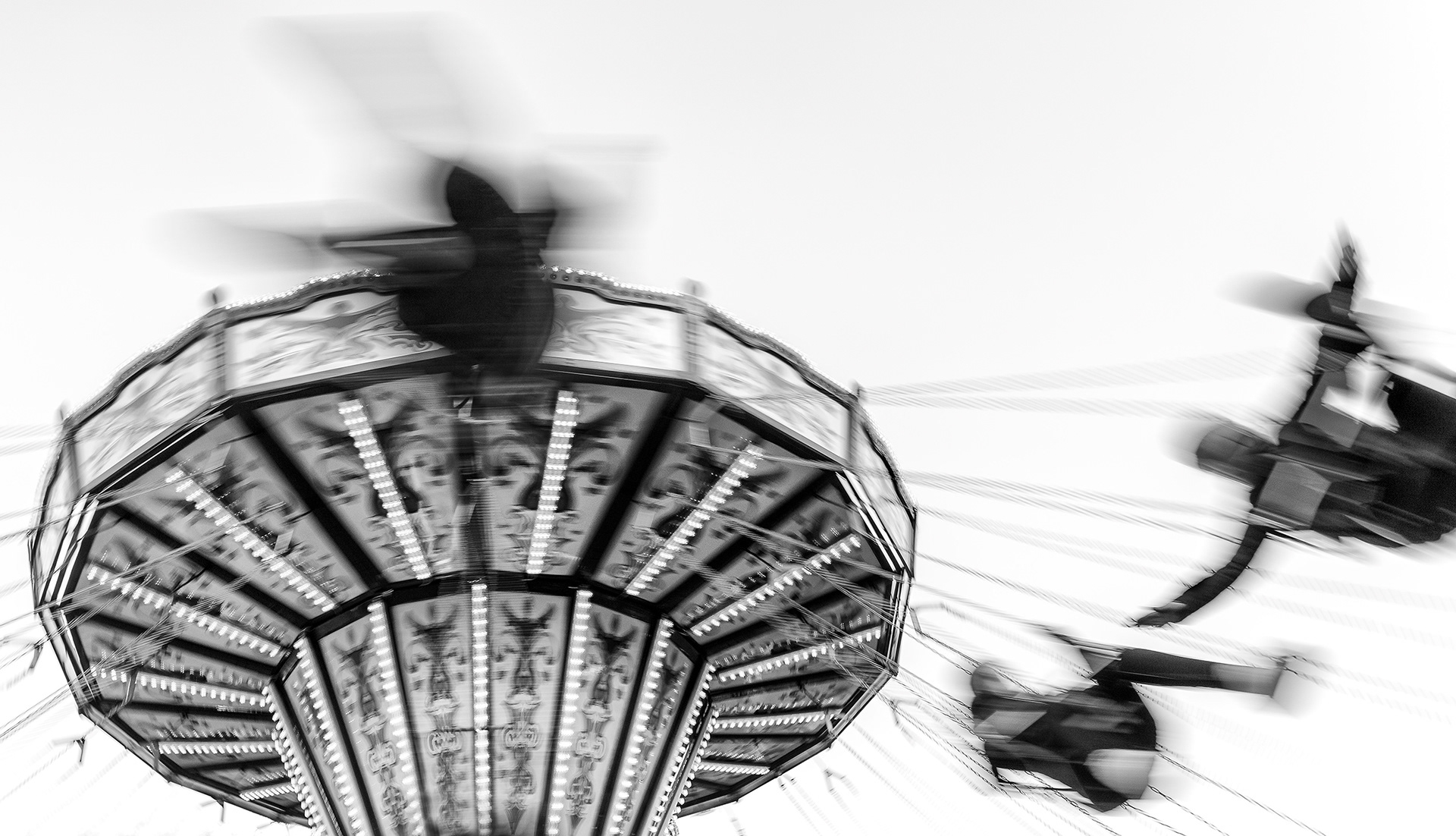 Swings at the Christmas Fair. Princes Street. Edinburgh.