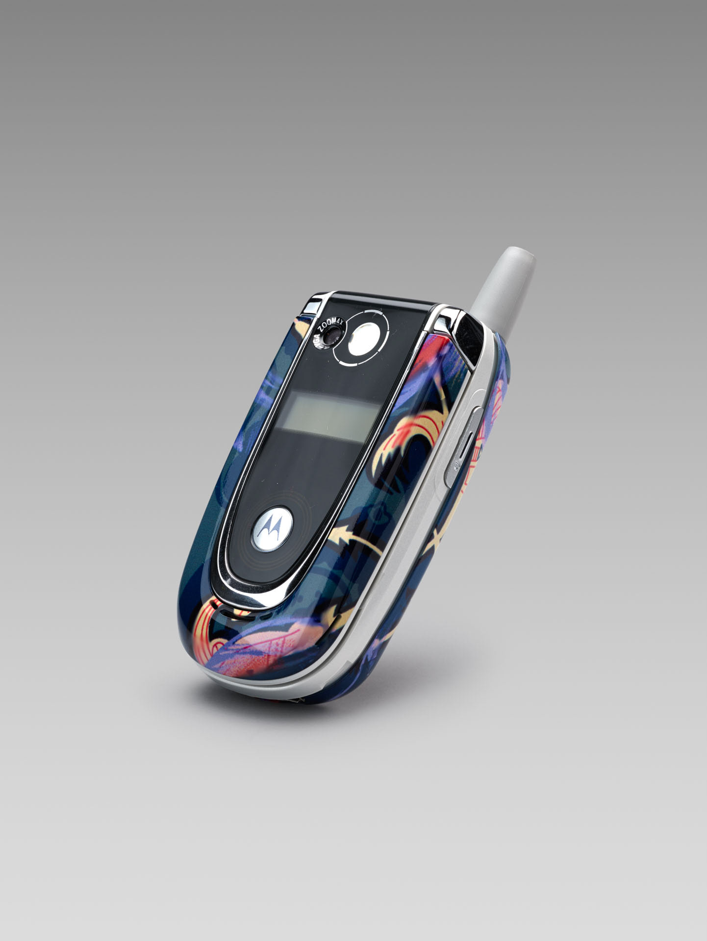 Motorola & Vivienne Westwood. 'Clamshell' phone with colourful cover, produced to coincide with the V&A Westwood retrospective in 2004 © Victoria and Albert Museum, London