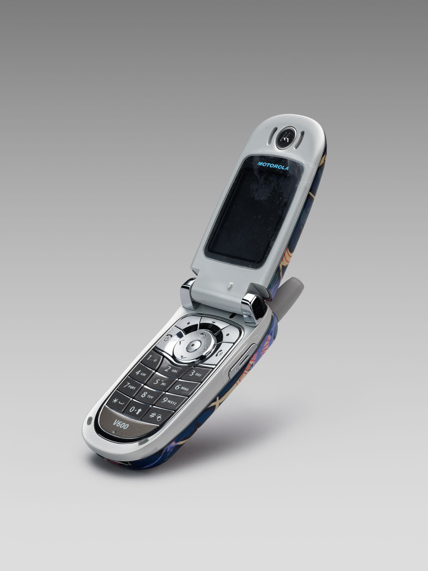 Motorola & Vivienne Westwood. 'Clamshell' phone with colourful cover, produced to coincide with the V&A Westwood retrospective in 2004 © Victoria and Albert Museum, London