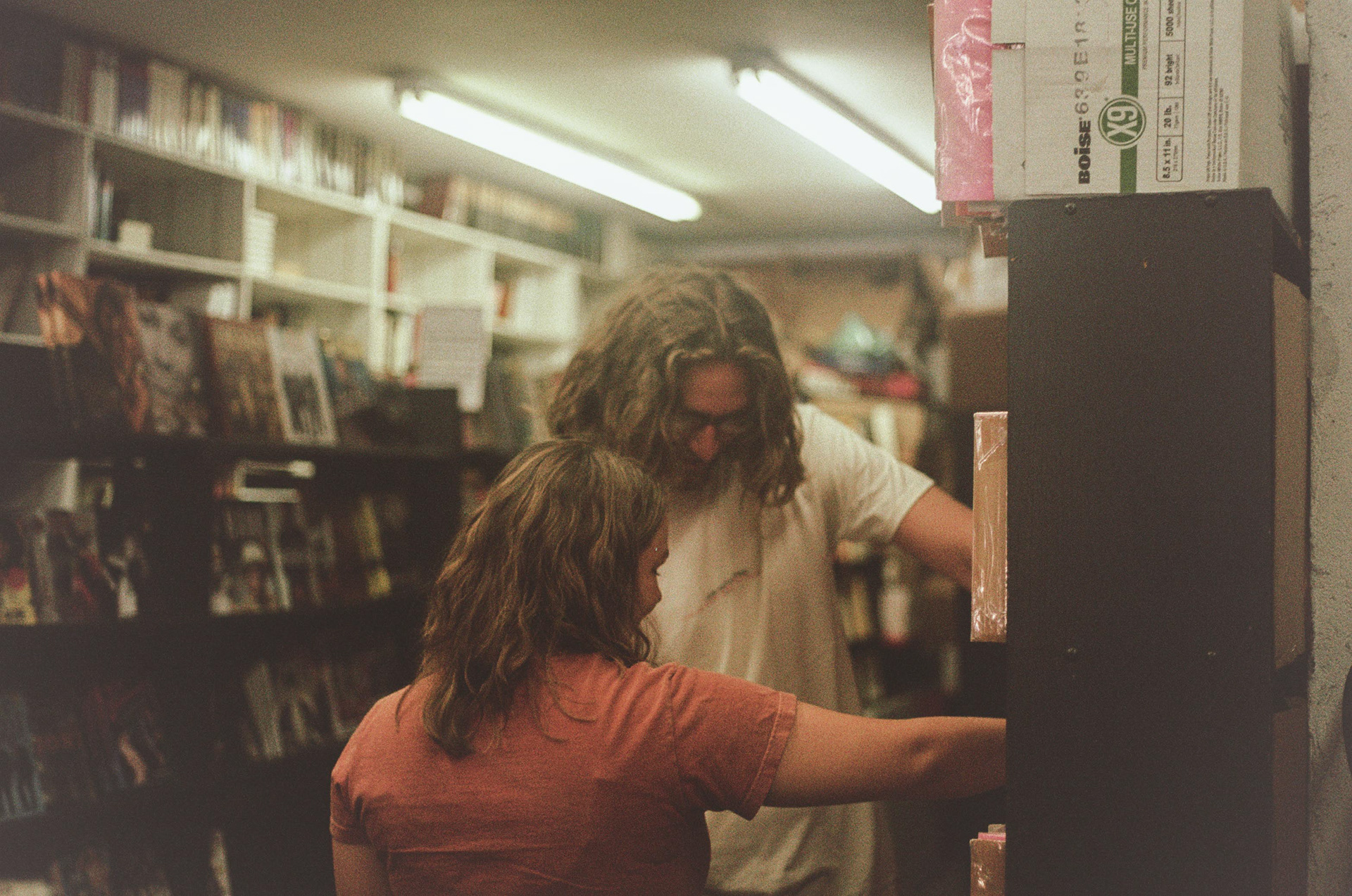 A Trip Down Hollywood Lane – This was the third roll I had ever shot and my first time shooting on Kodak Colorplus 200. After guiding my friends around Hollywood, we had an impromptu photo shoot in a movie bookstore on Hollywood Boulevard. I centered my friends just under the lights, between the bookcases, and then used their arms to align the split image focus manually. I also adjusted the aperture and shutter speed to achieve the nostalgic shallow depth of field.
