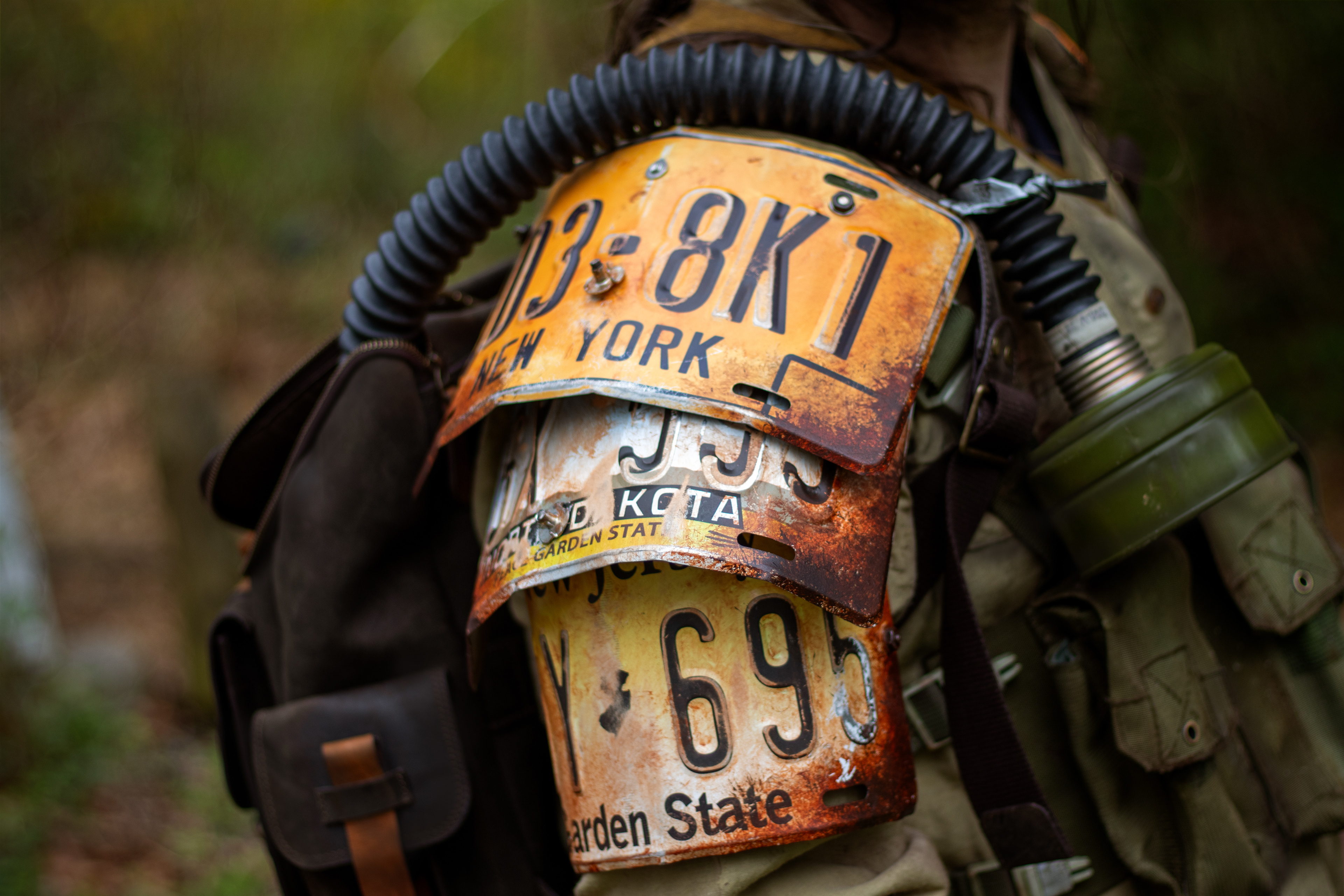 The Man, a veteran wasteland survivalist | Custom license-plate shoulder armor, weathered clothing, and miscellaneous survival and combat gear.