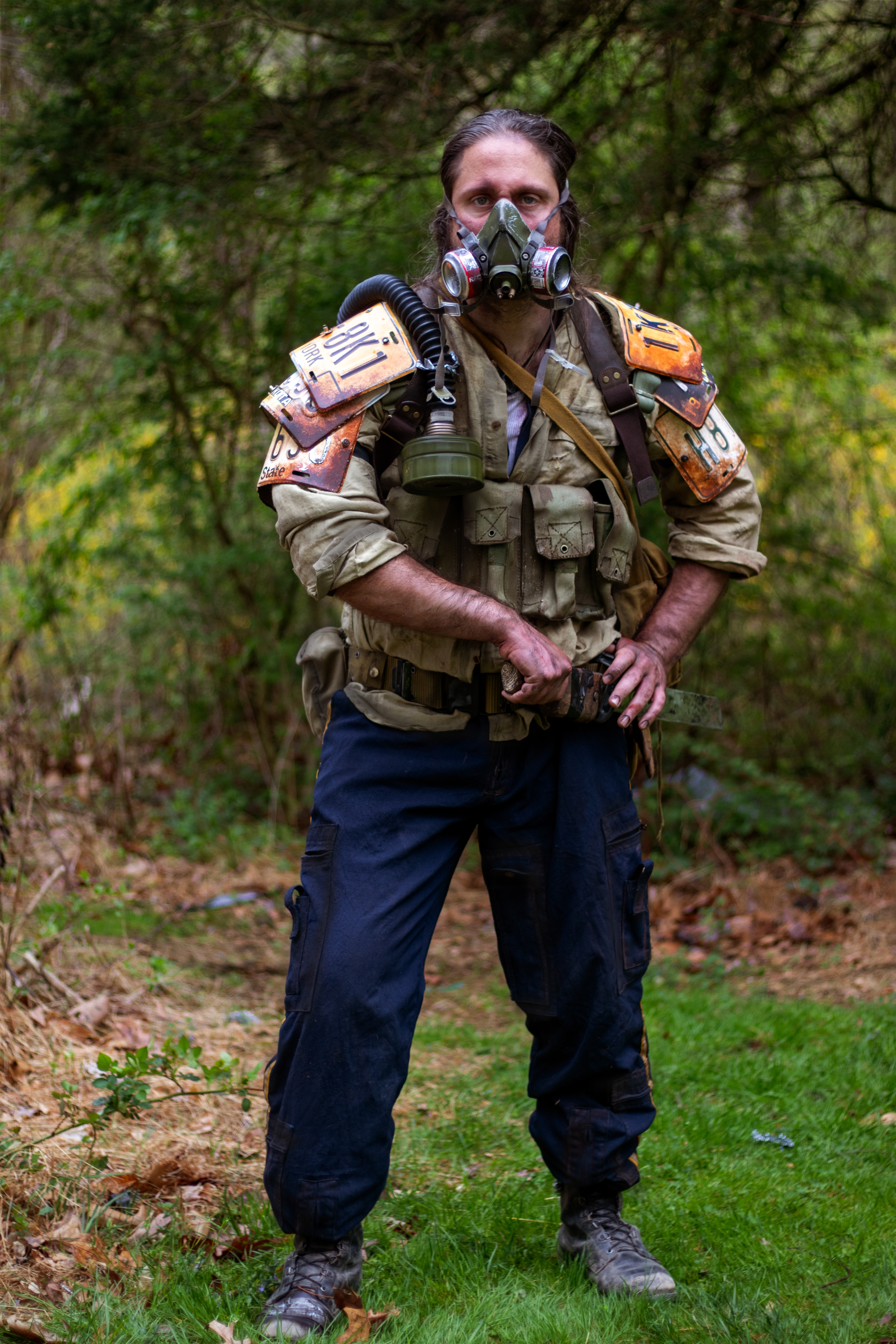 The Man, a veteran wasteland survivalist | Custom license-plate shoulder armor, weathered clothing, and miscellaneous survival and combat gear.