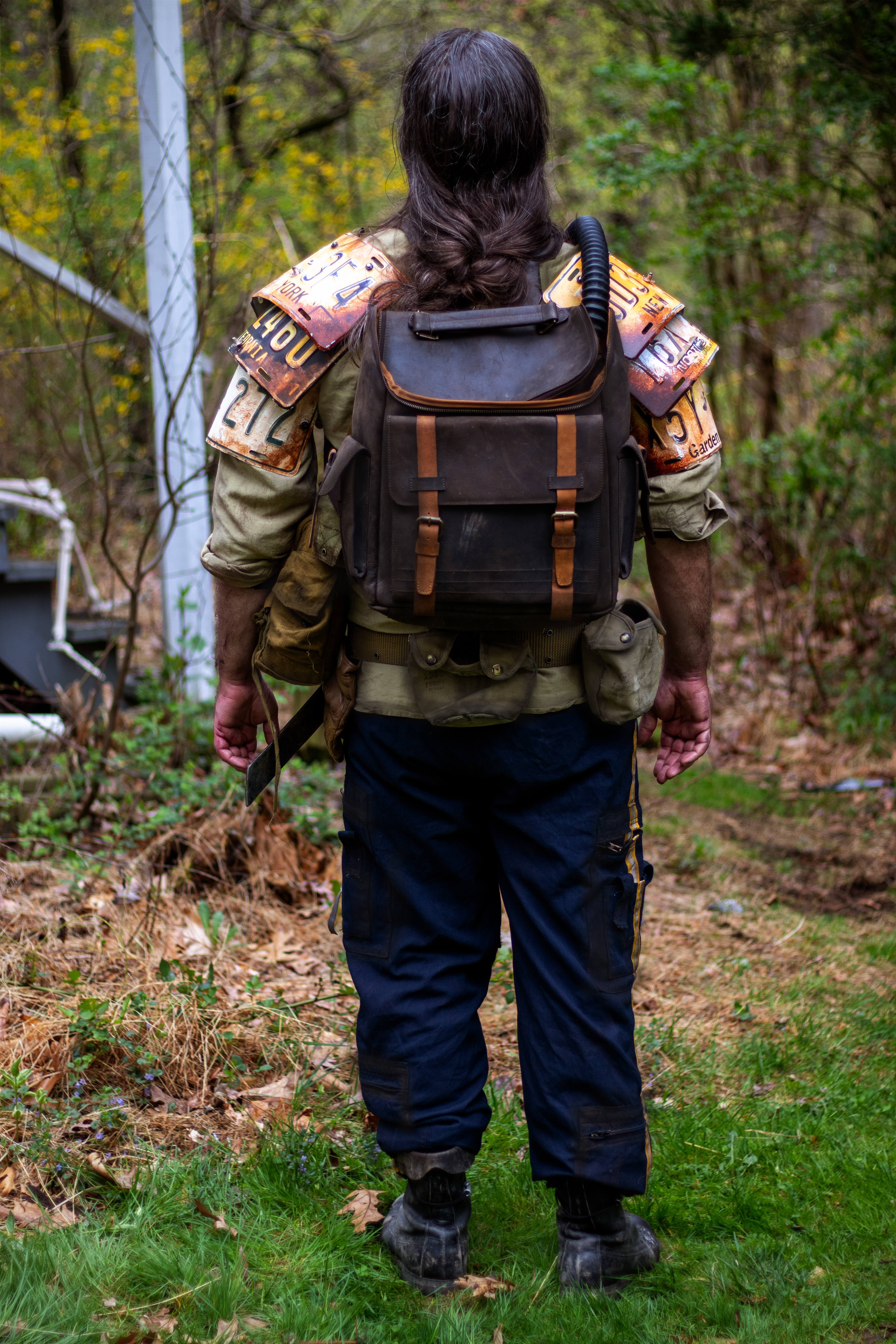 The Man, a veteran wasteland survivalist | Custom license-plate shoulder armor, weathered clothing, and miscellaneous survival and combat gear.