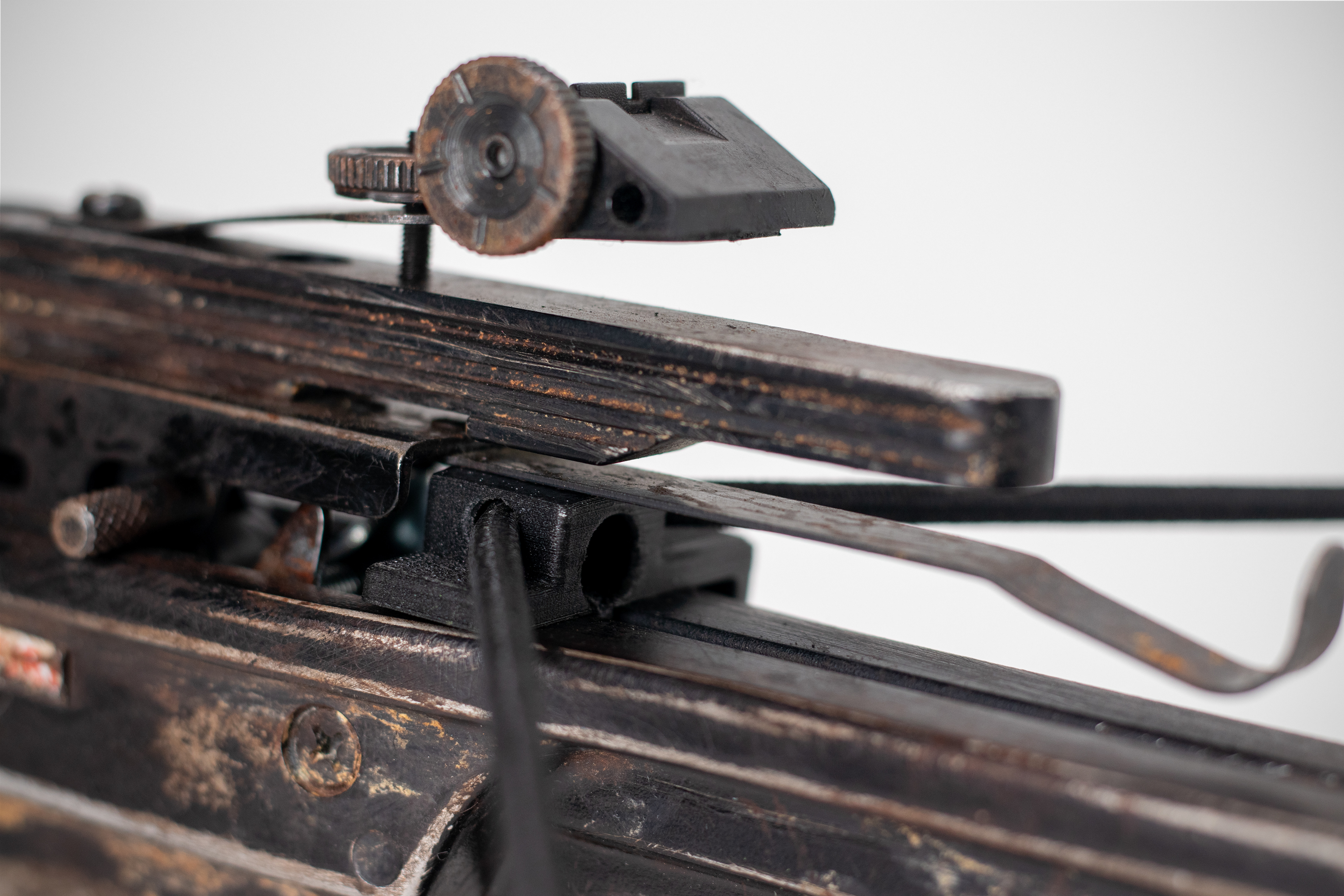 3D-Printed String Immobilizer captures the string in front of the trigger so that the crossbow cannot fire a bolt