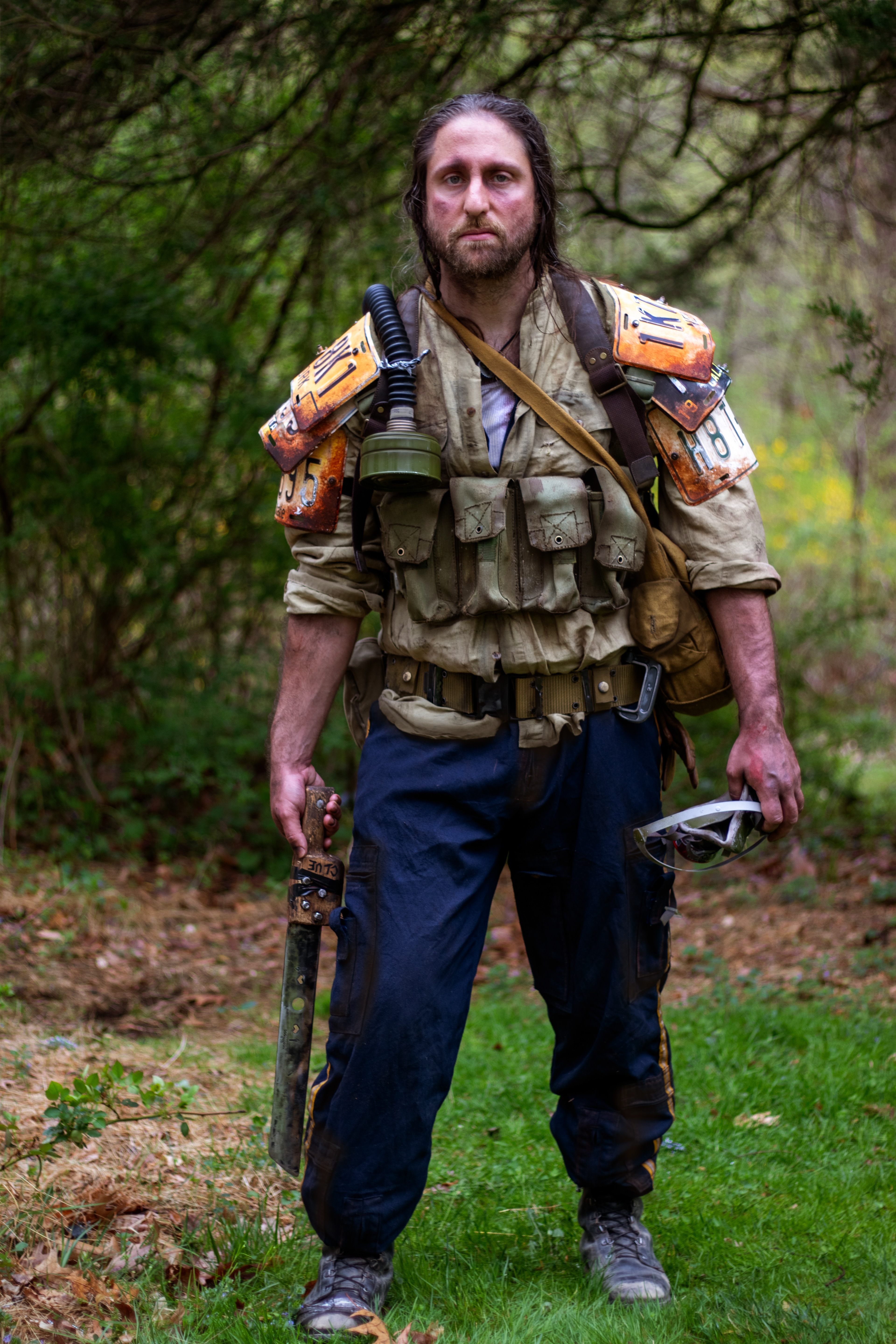 The Man, a veteran wasteland survivalist | Custom license-plate shoulder armor, weathered clothing, and miscellaneous survival and combat gear.
