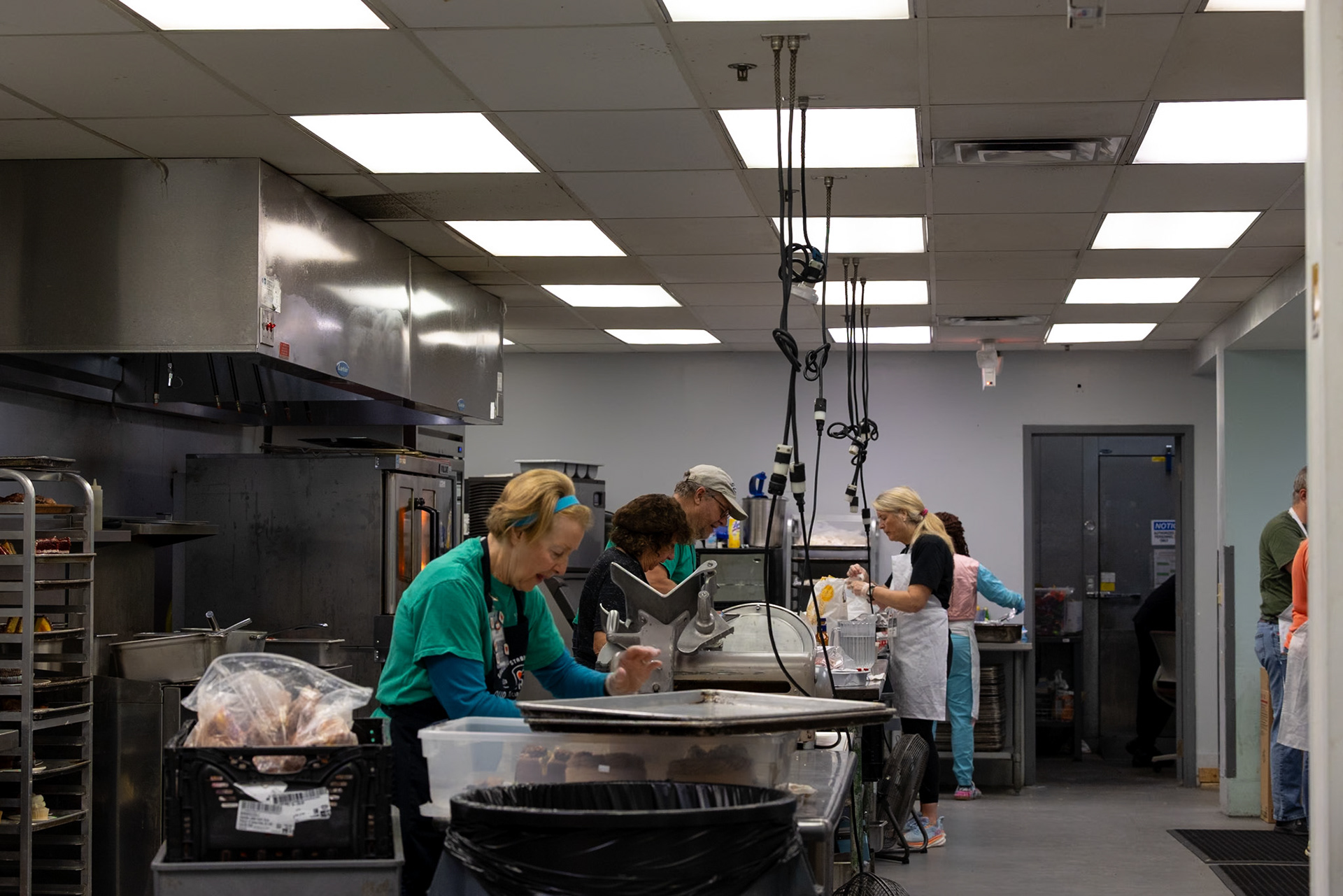 In the busy kitchen of Our Daily Bread, you can find numerous people hard at work, some being Our Daily Bread’s multiple head chefs who work alongside staff members and volunteers. Something important about Our Daily Bread is that they make a large amount of their food in the kitchen instead of just heating it up. Staff members and volunteers can be found preparing, serving, organizing, and storing food, which will all be set to serve their hundreds of guests.