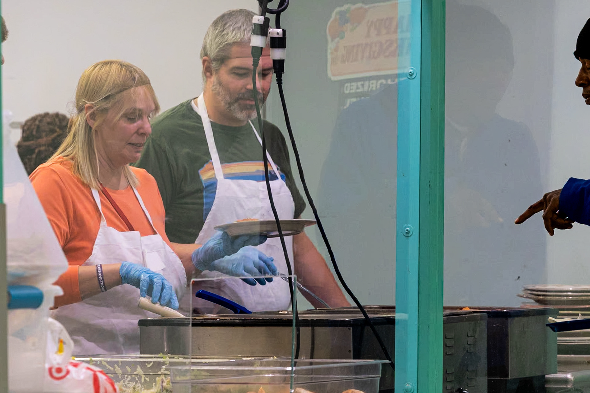 Similar to a cafeteria at a public school, the volunteers of our Daily Bread feed their guests on plastic lunch trays from behind a wall of plexiglass on November 10, 2023. Established in 1985 and founded by Ruth “Cookie” Vogelpohl, Our Daily Bread is a soup kitchen designed to help the homeless community in Cincinnati Ohio. Their dining room is opened Monday-Friday from 8:30 am to 11:30 am, but a home cooked meal is just the beginning of what they offer.