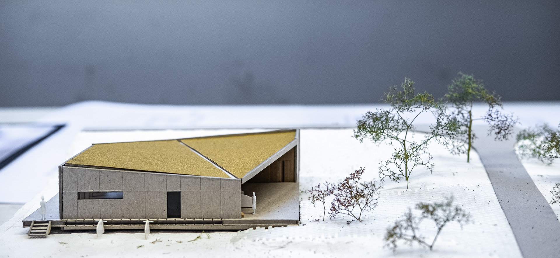 In this picture of the model, you clearly see the positioning of the pavilion within the landscape. A piece of grass is semi-hardened for easy bike acces towards the pavilion.